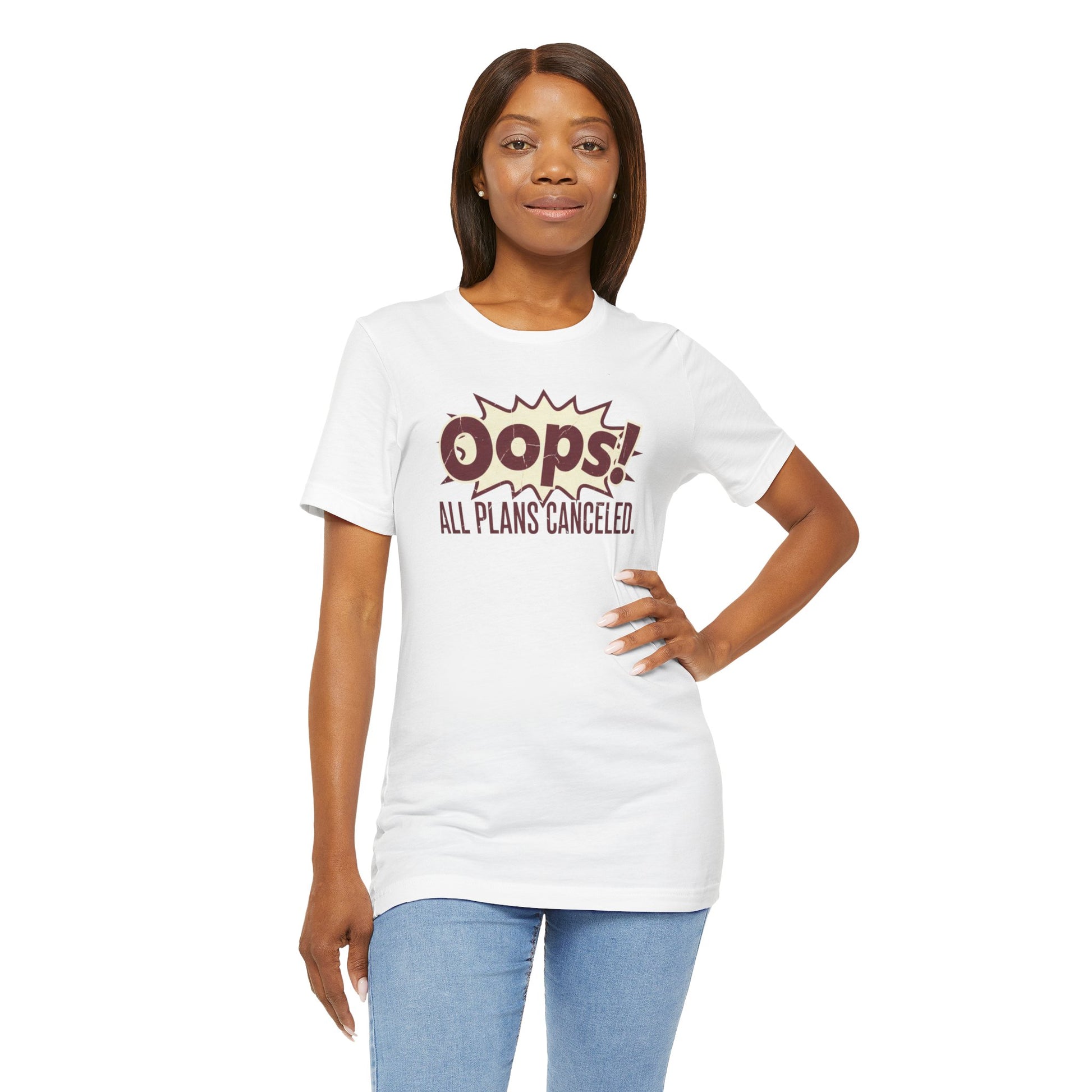 Woman wearing a white t-shirt with 'Oops! All Plans Canceled' text on a white background