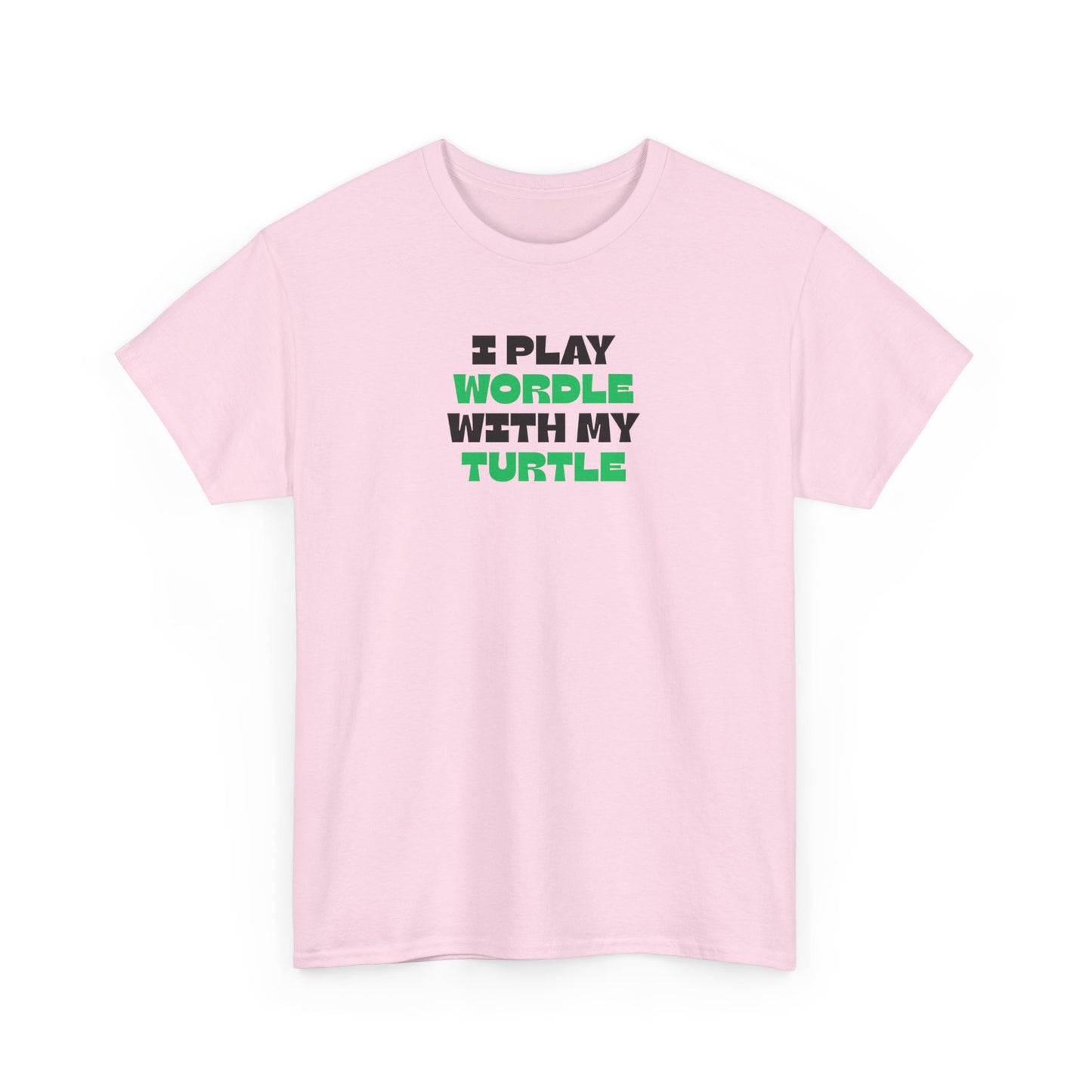 Pink t-shirt with text 'I Play Wordle With My Turtle' on a white background