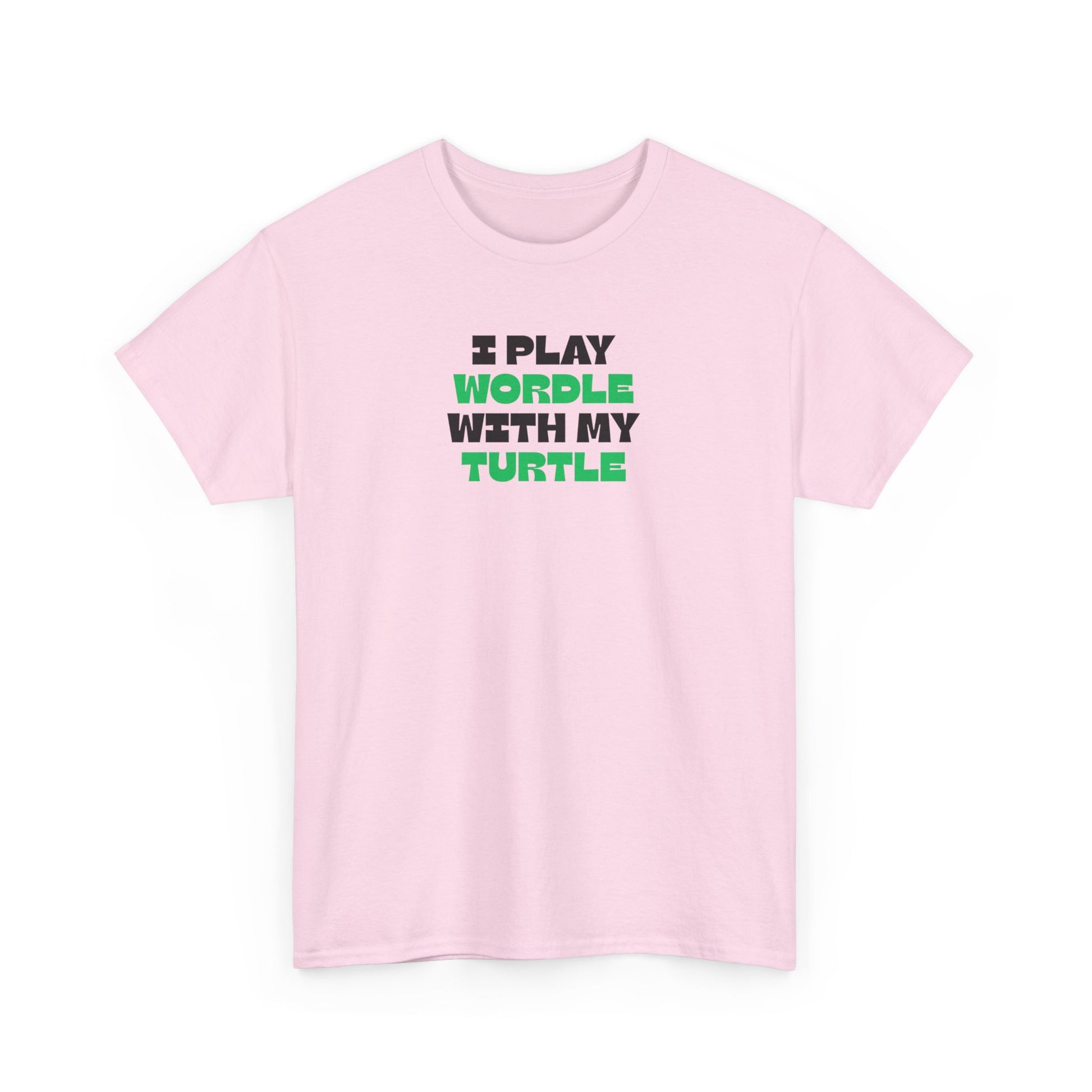 Pink t-shirt with text 'I Play Wordle With My Turtle' on a white background