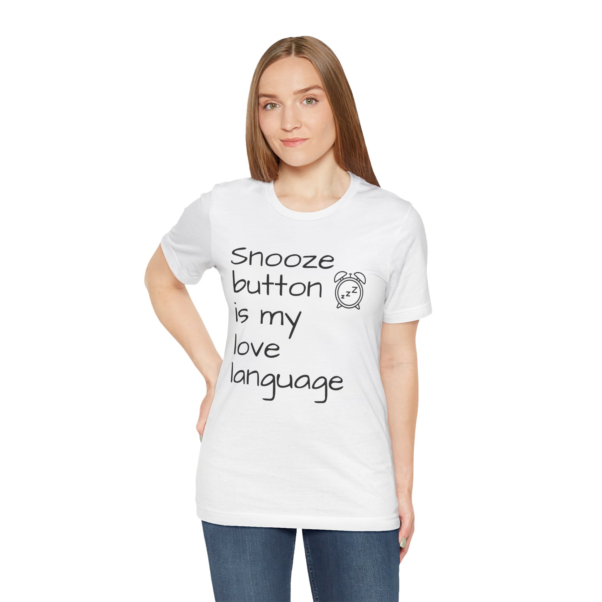 Woman wearing a white t-shirt with text 'Snooze button is my love language' and a graphic on a white background