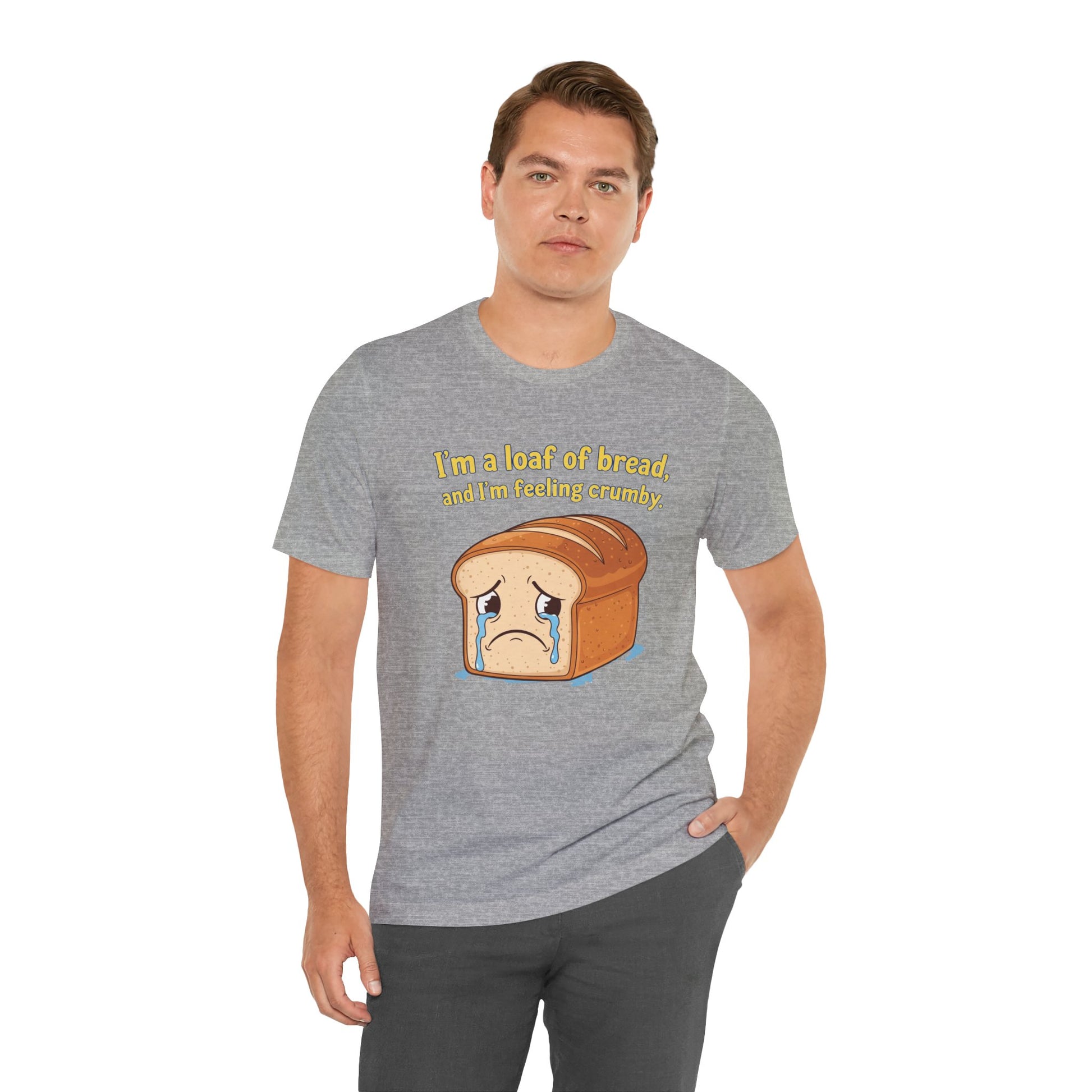 Man wearing a gray t-shirt with a bread graphic and text on a white background. Text says, 'I'm a loaf of bread, and I'm feeling crumby'