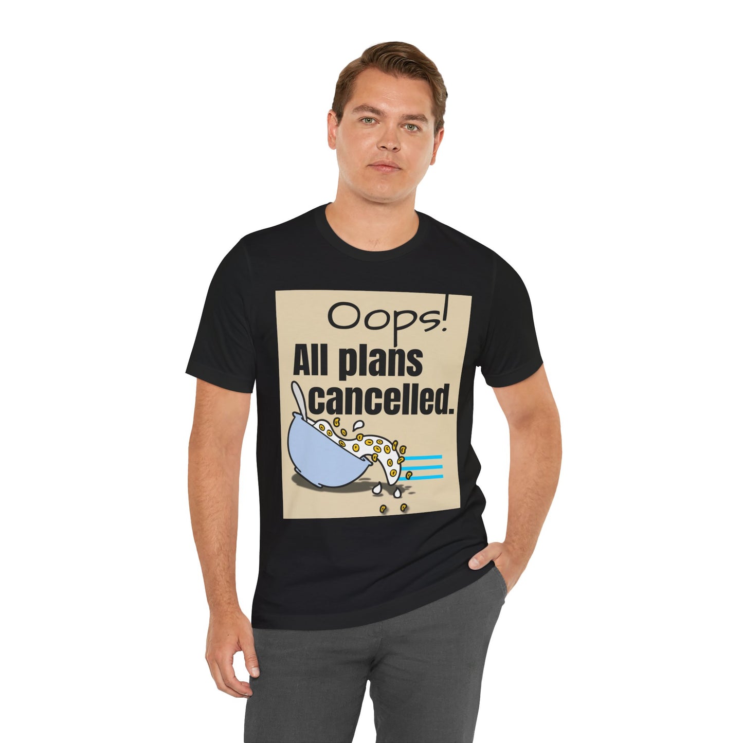 Man wearing a black t-shirt with a graphic and text 'Oops! All plans cancelled.' on a white background