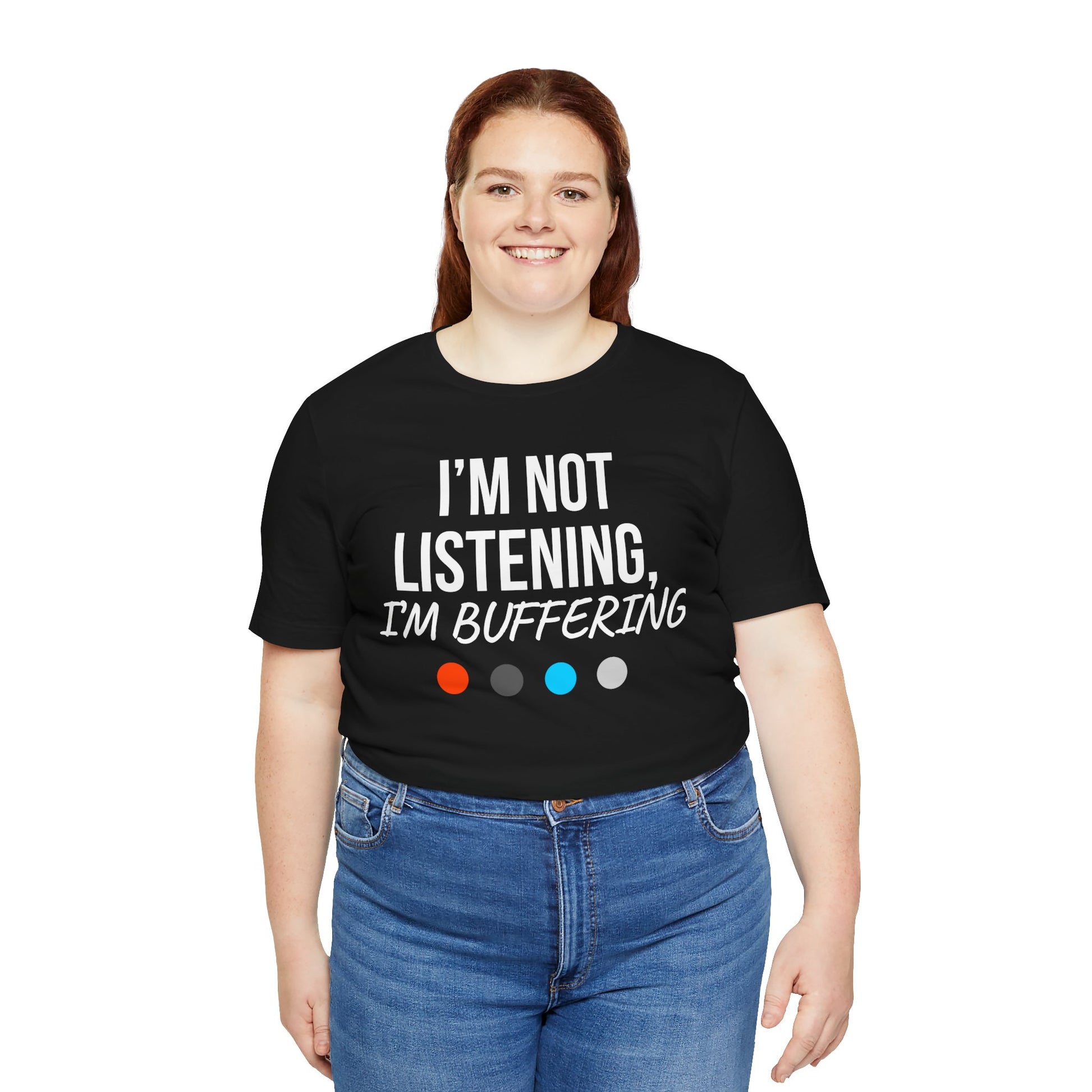 Person wearing a black t-shirt with 'I'm not listening, I'm buffering' text on a white background