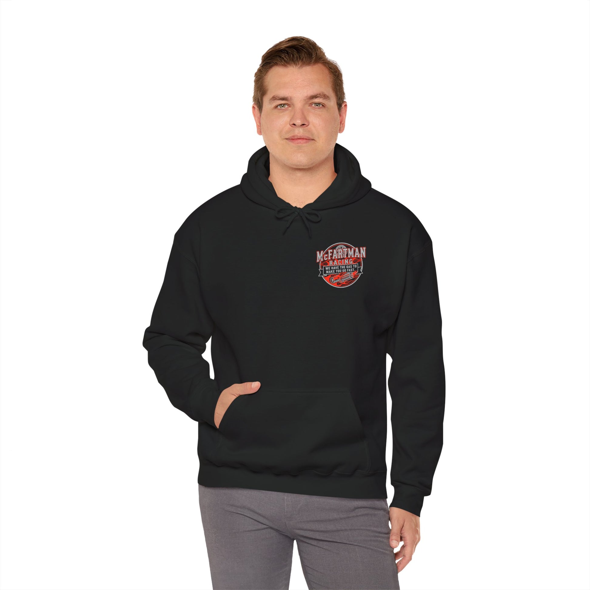 Man wearing a black hoodie with a logo McFartman Racing We have the gas to make you go fast on a white background