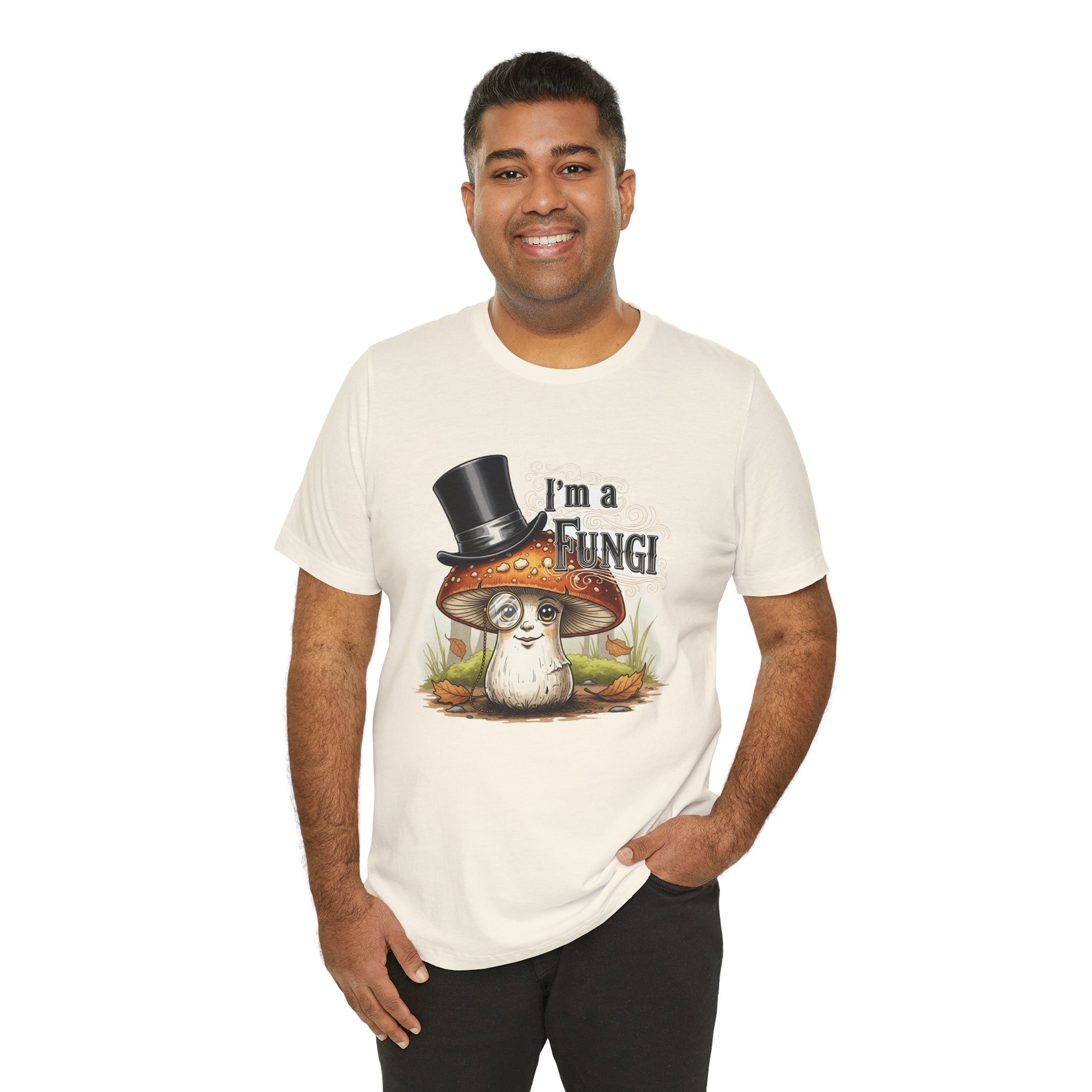 Man wearing a natural t-shirt with a mushroom graphic and text 'I'm a Fungi' on a white background