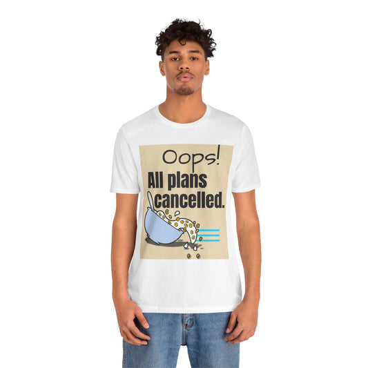 Person wearing a white t-shirt with a graphic and text 'Oops! All plans cancelled.'