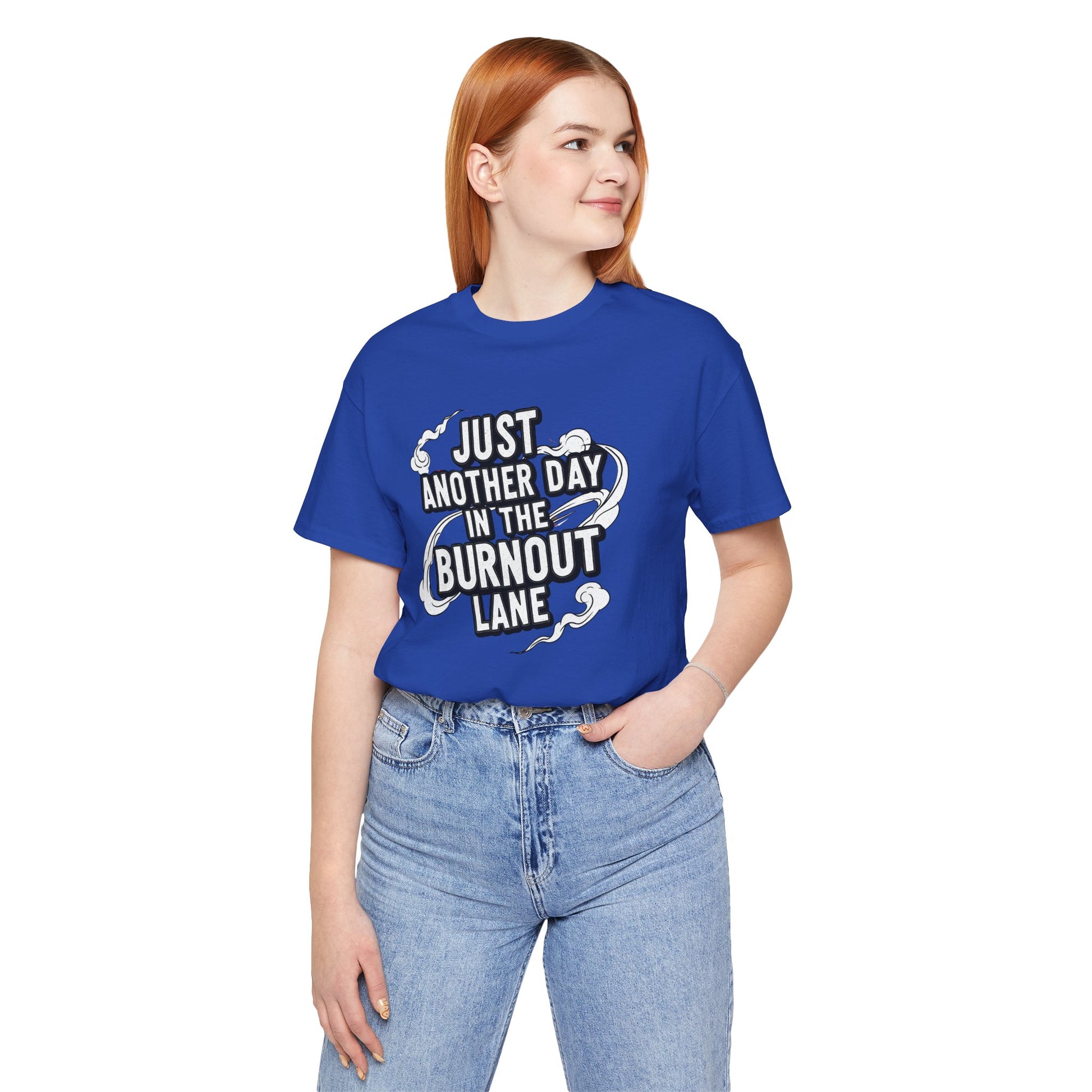 Person wearing a blue t-shirt with text and graphic design on a white background