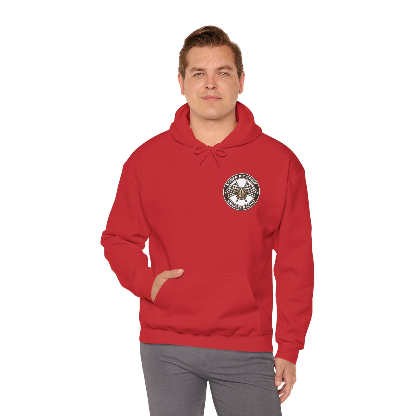 Man wearing a red hoodie with a 'Sober Pit Crew Knarley Racing' logo on a white background