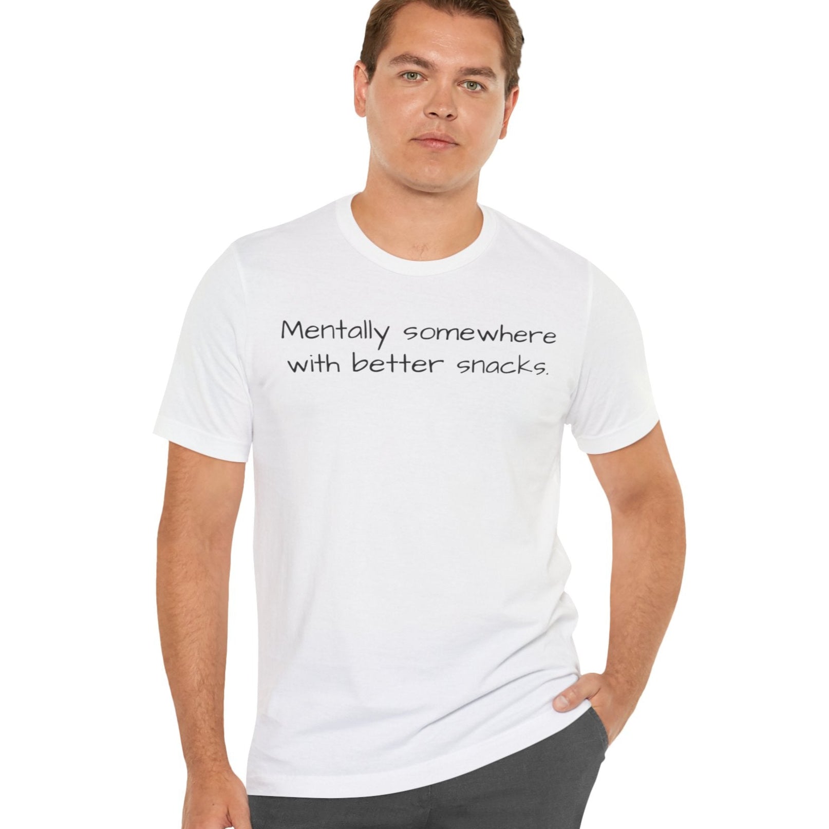 Man wearing a white t-shirt with text 'Mentally somewhere with better snacks'  on a white background