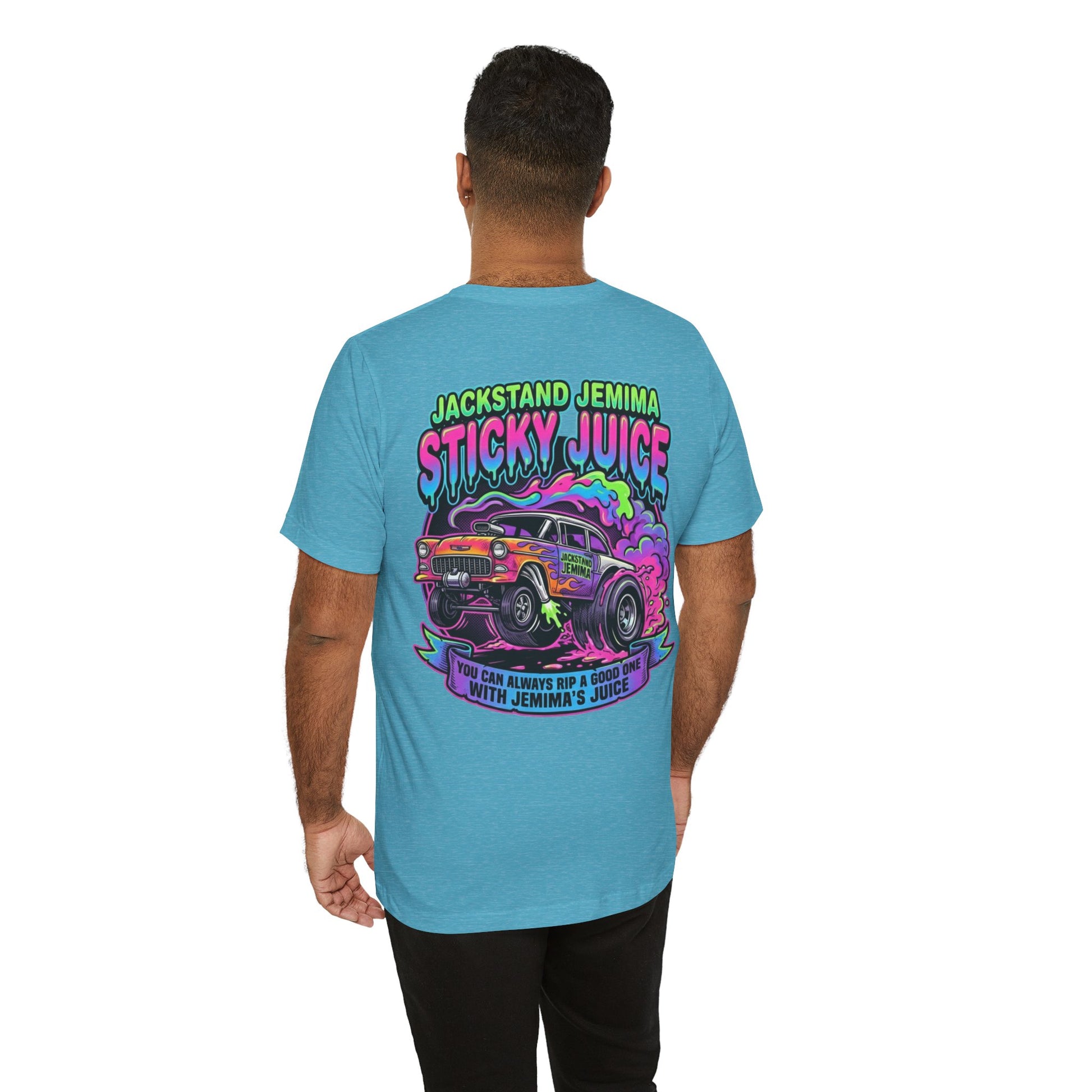 Man wearing a blue t-shirt with a colorful graphic design on the back, featuring text 'Jackedstand Jemima Sticky Juice You Can Always Rip A Good One With Jemima's Juice' and a car illustration.
