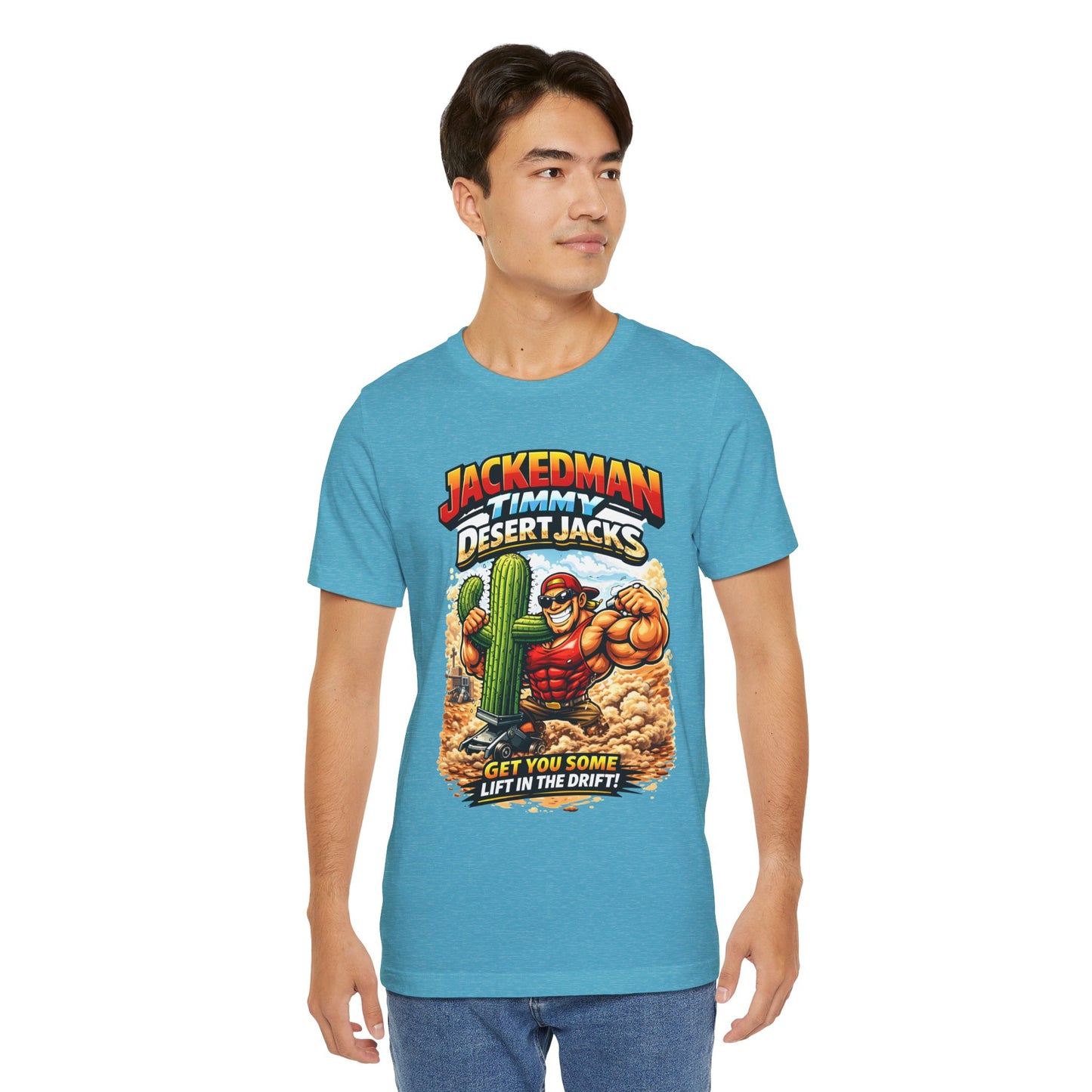 Person wearing a blue t-shirt with a graphic design and 'Jackedman Timmy Desert Jacks Get You Some Lift In The Drift' text on a white background