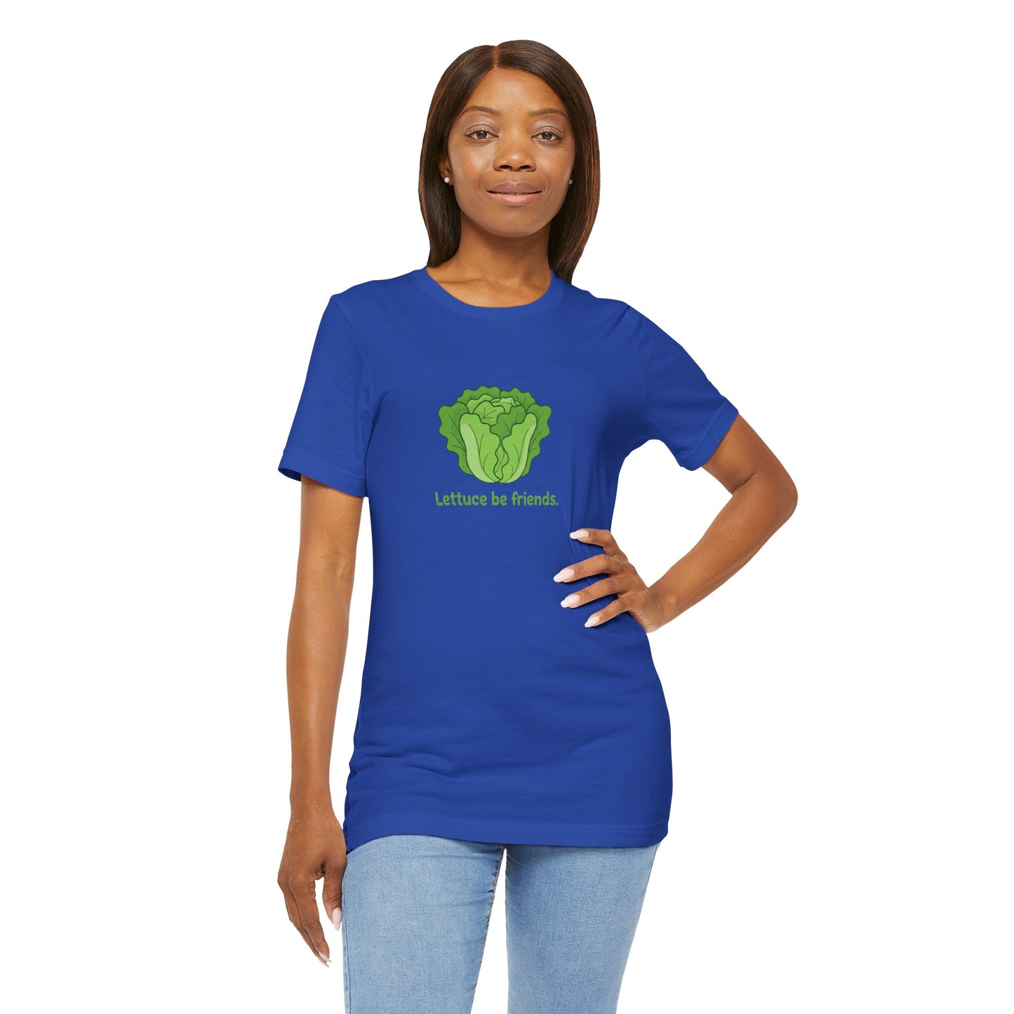 Woman wearing a blue t-shirt with a green graphic and text 'Lettuce be friends' on a white background