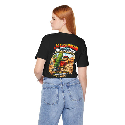 Person wearing a black t-shirt with a graphic design and 'Jackedman Timmy Desert Jacks Get You Some Lift In The Drift' text on the back, standing against a white background
