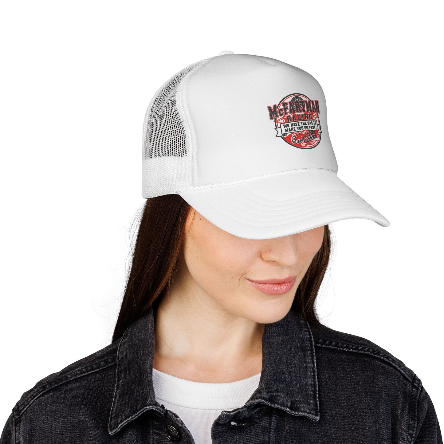 Person wearing a white trucker hat with a logo McFARTMAN Racing We have the gas to make you go fast on a white background