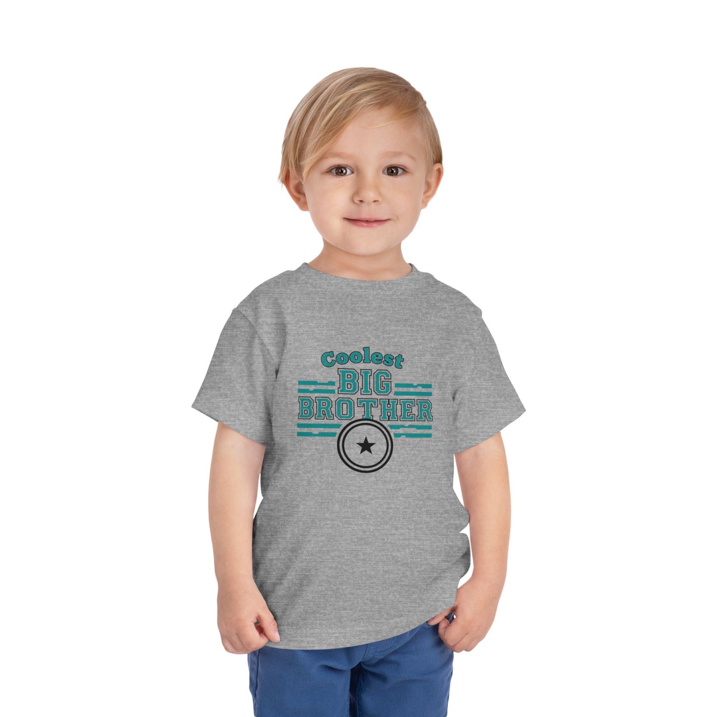 Child wearing a gray t-shirt with 'Coolest Big Brother' text on a white background