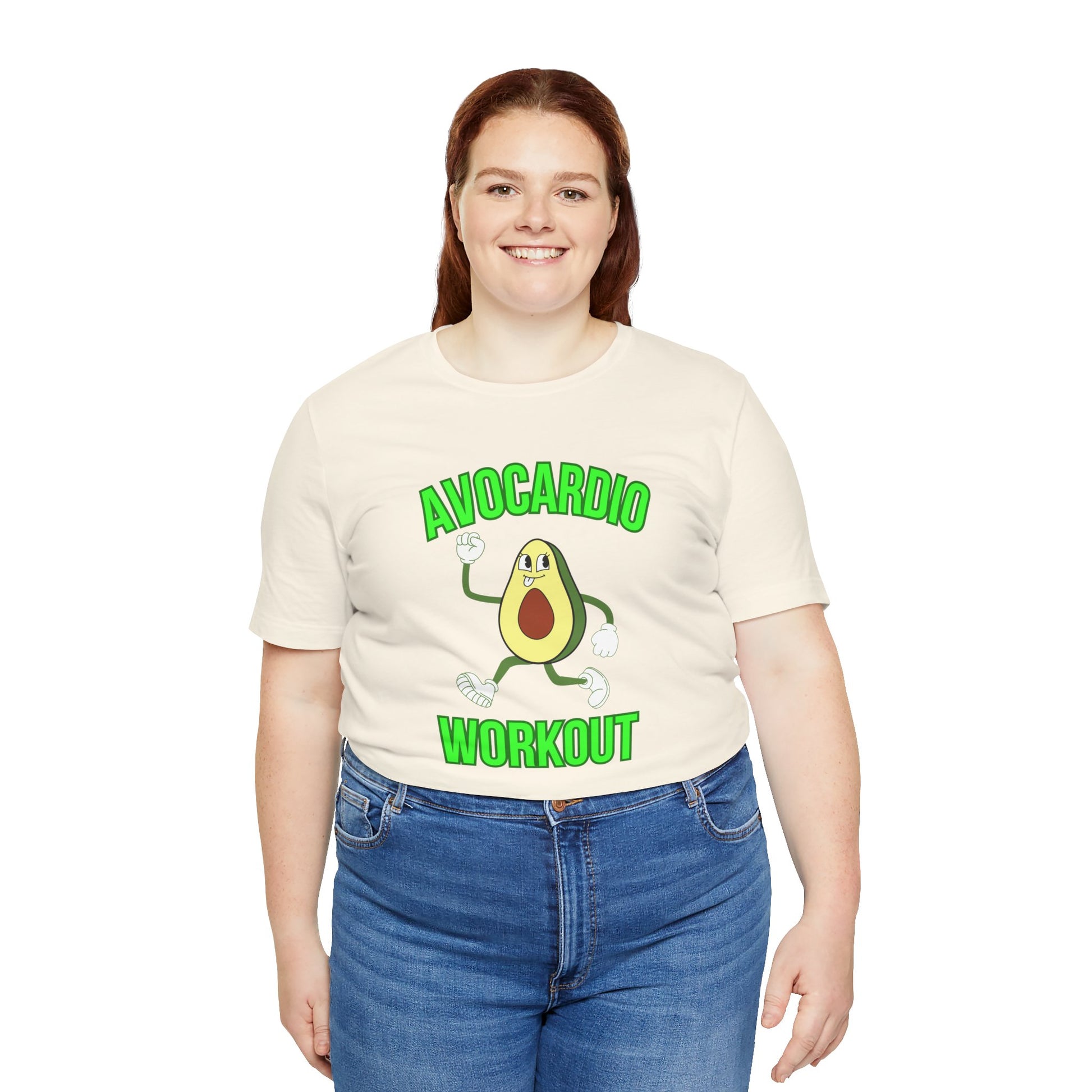 Person wearing a cream t-shirt with an avocado graphic and text 'Avocardio workout' on a white background