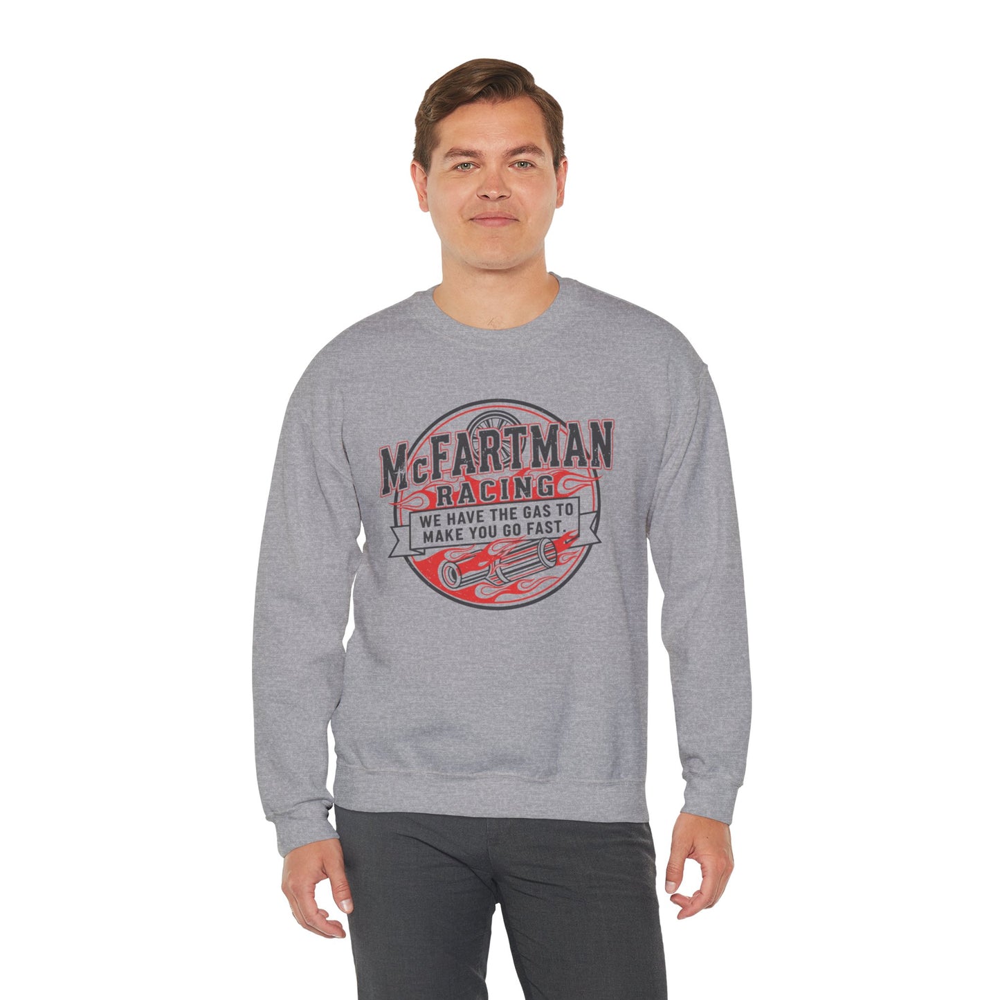 Man wearing a gray sweatshirt with a red and white graphic design McFartman Racing We have the gas to make you go fast on a white background