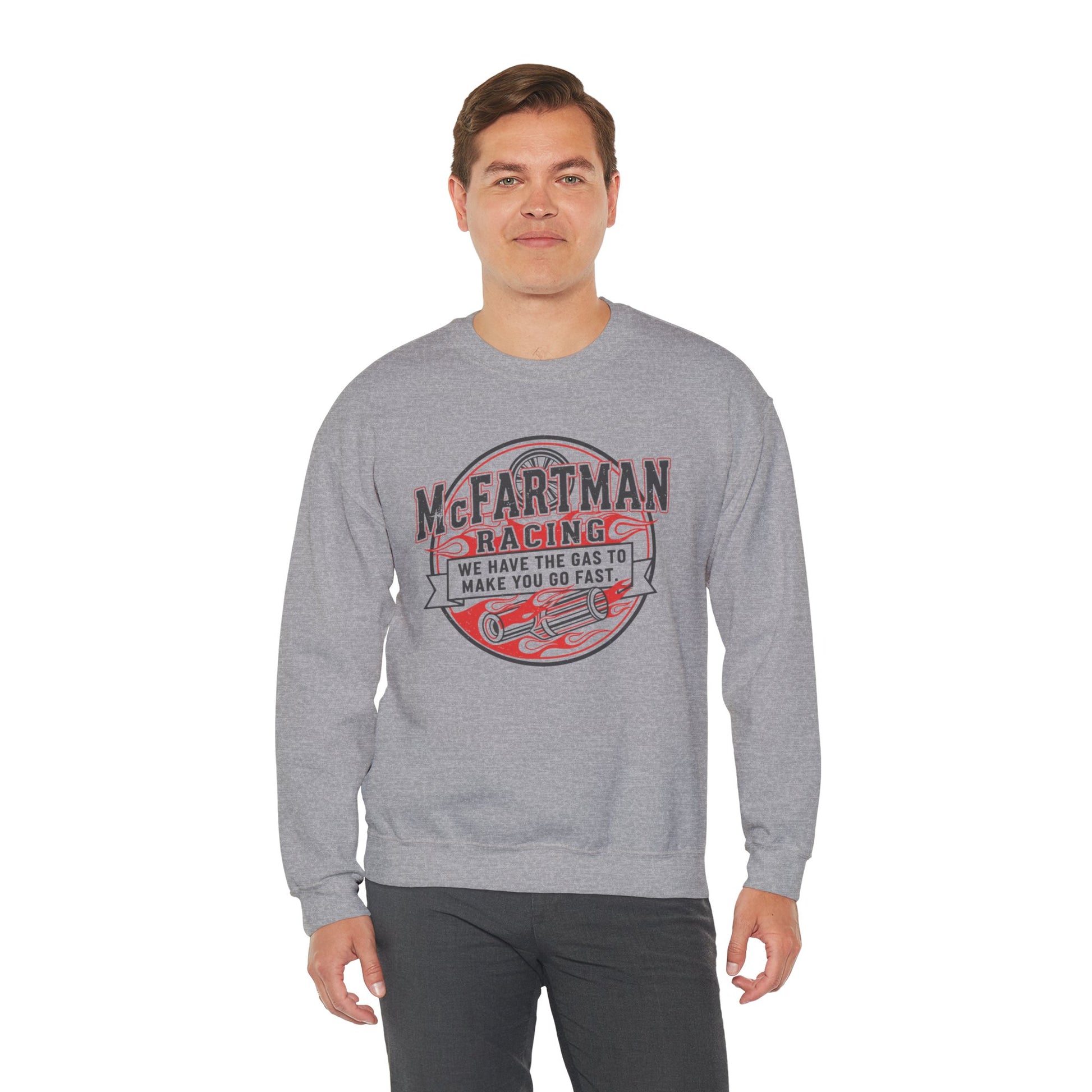 Man wearing a gray sweatshirt with a red and white graphic design McFartman Racing We have the gas to make you go fast on a white background