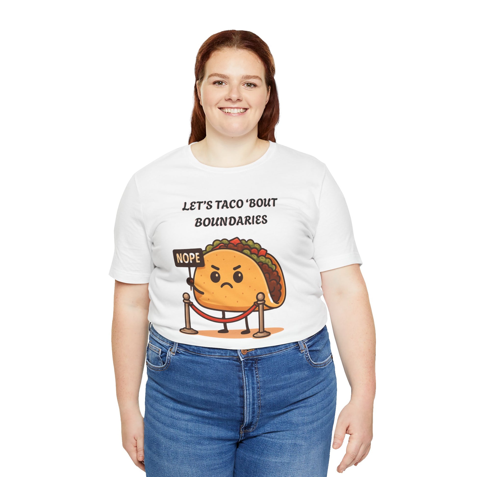 Person wearing a white t-shirt with a taco graphic and text 'Let's taco 'bout boundaries', on a white background