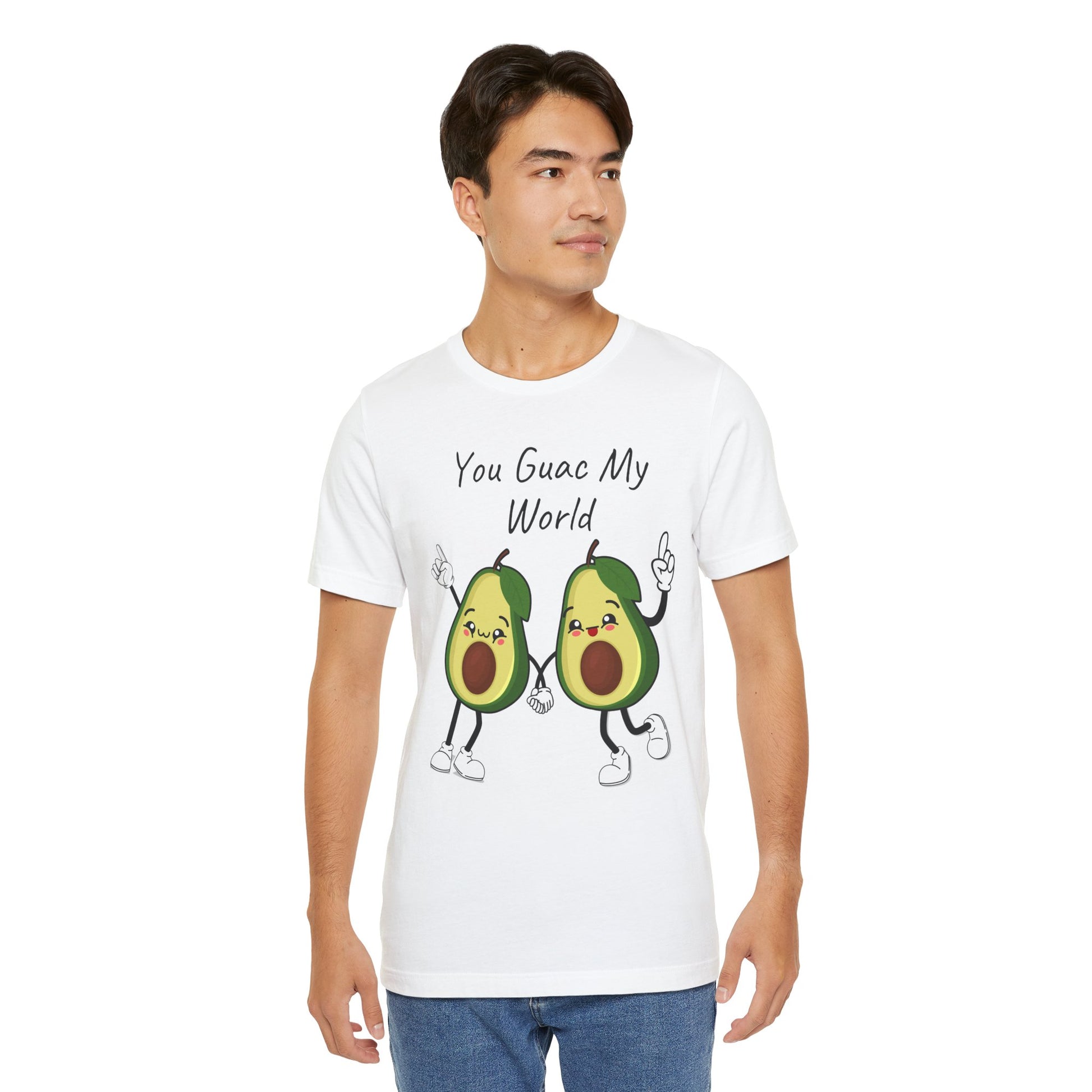 Man wearing a white t-shirt with avocado graphic and text 'You Guac My World' on a white background