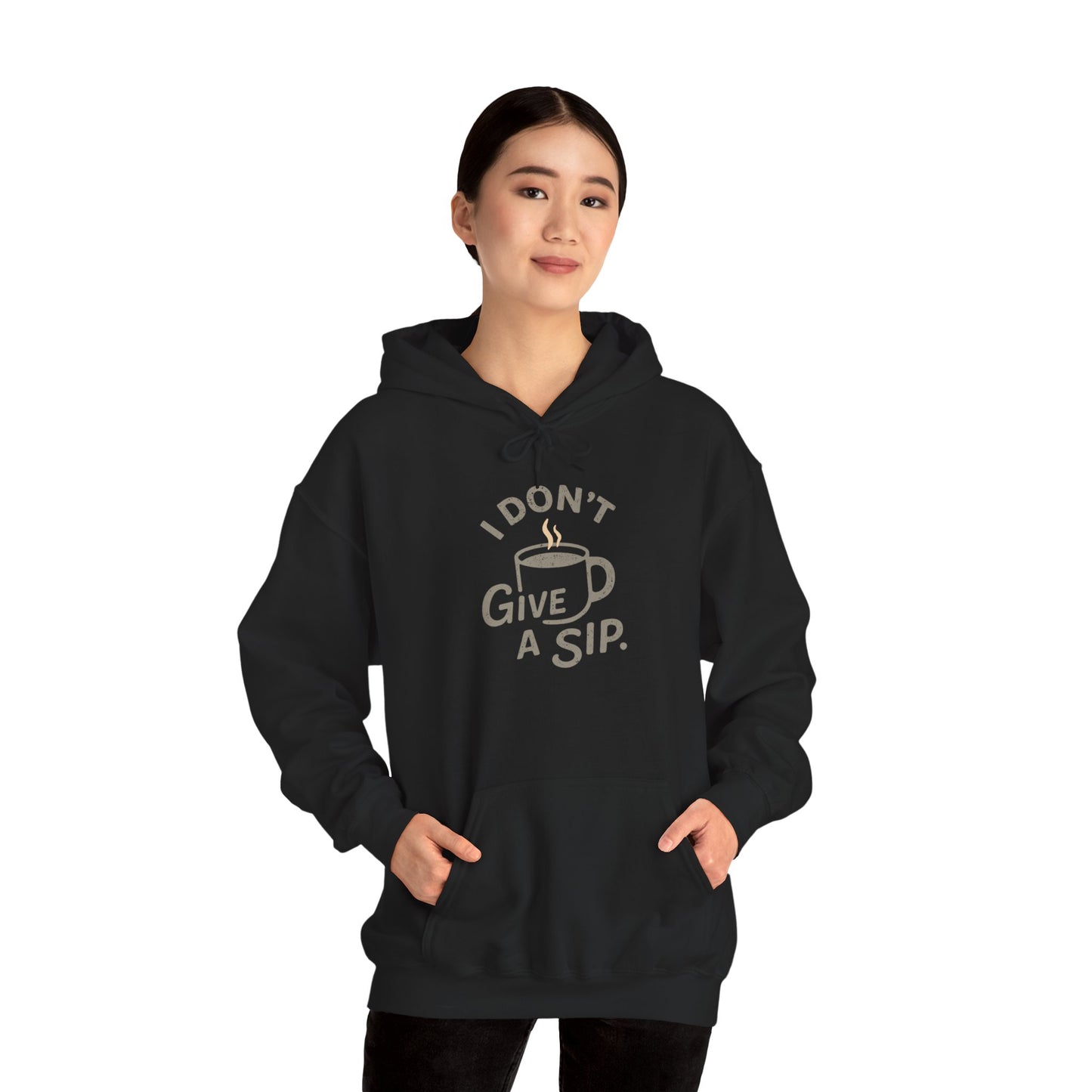Person wearing a black hoodie with 'I don't give a sip' text and graphic on a white background