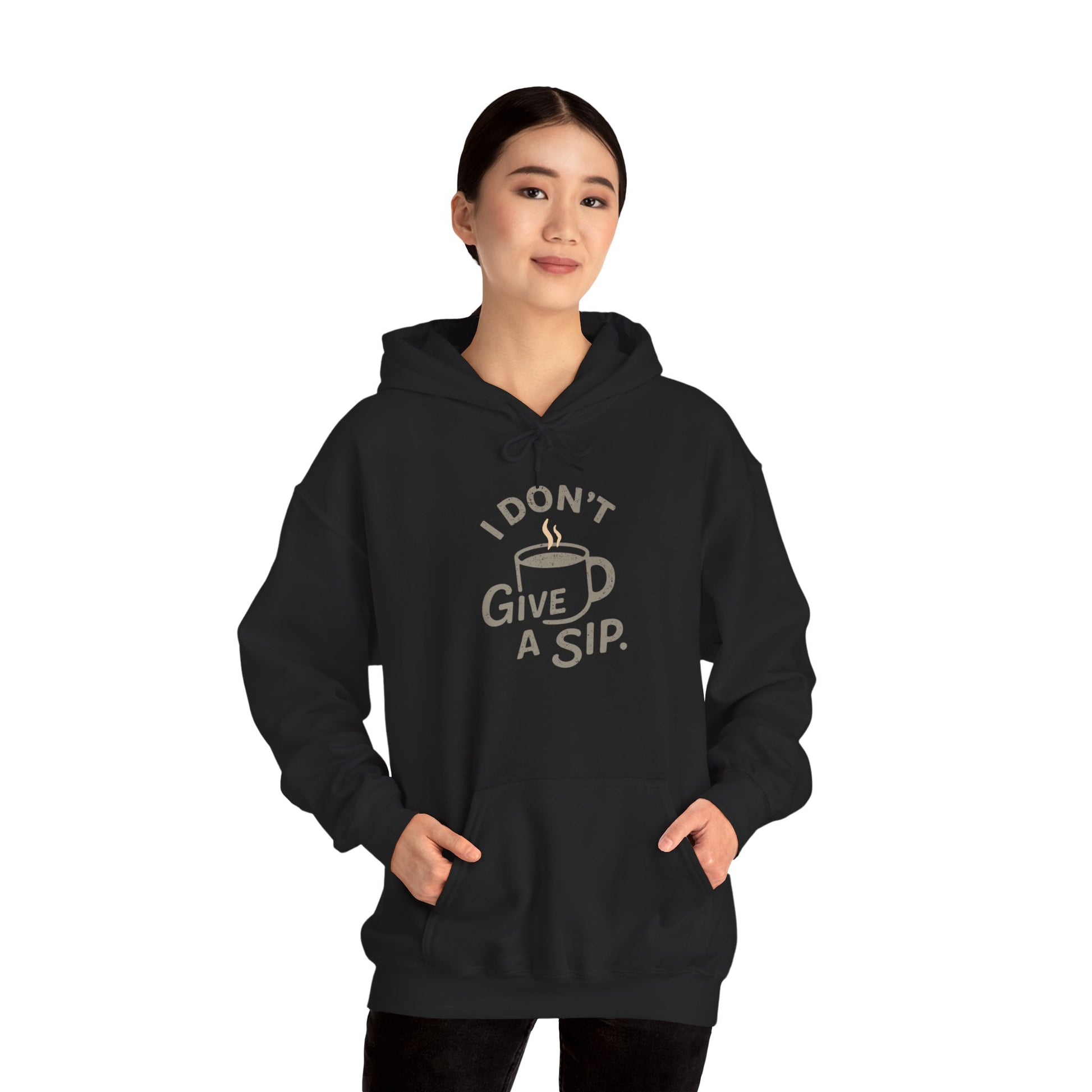 Person wearing a black hoodie with 'I don't give a sip' text and graphic on a white background