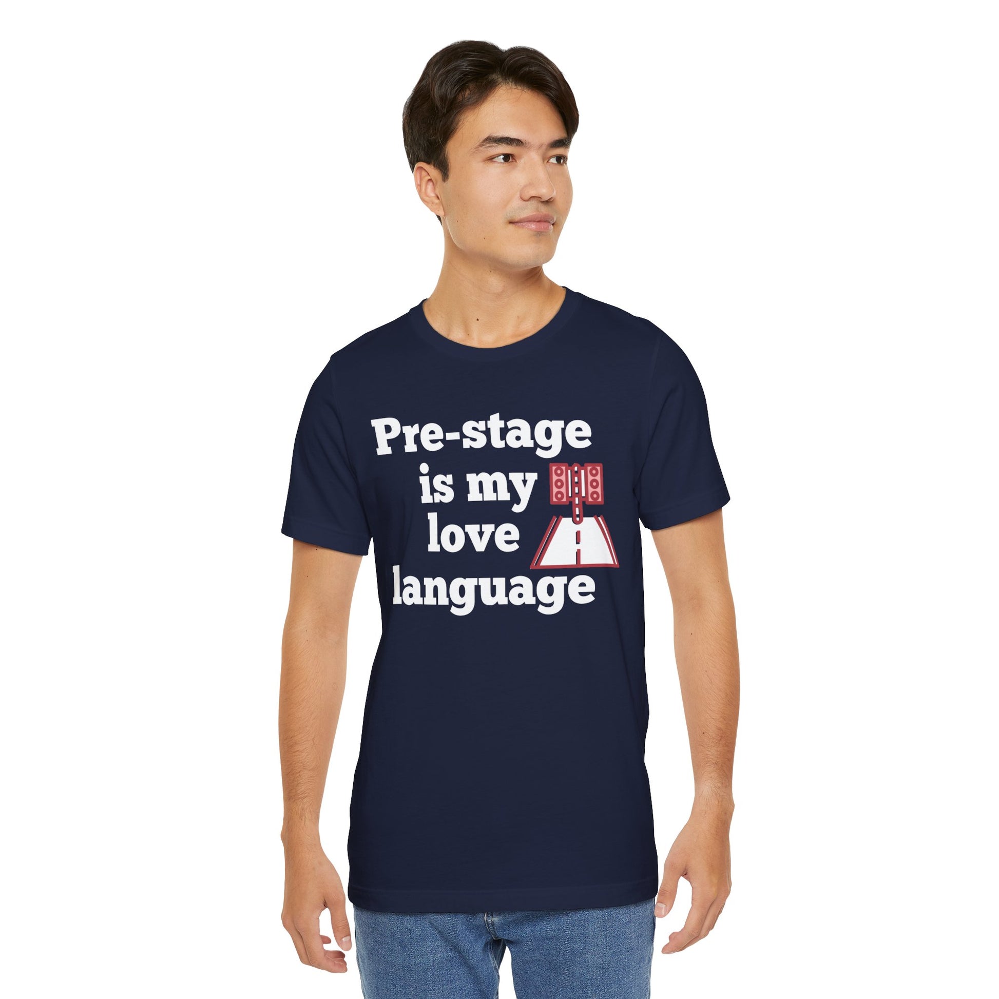 Man wearing a navy blue t-shirt with text 'Snooze button is my love language' and graphic design on a white background