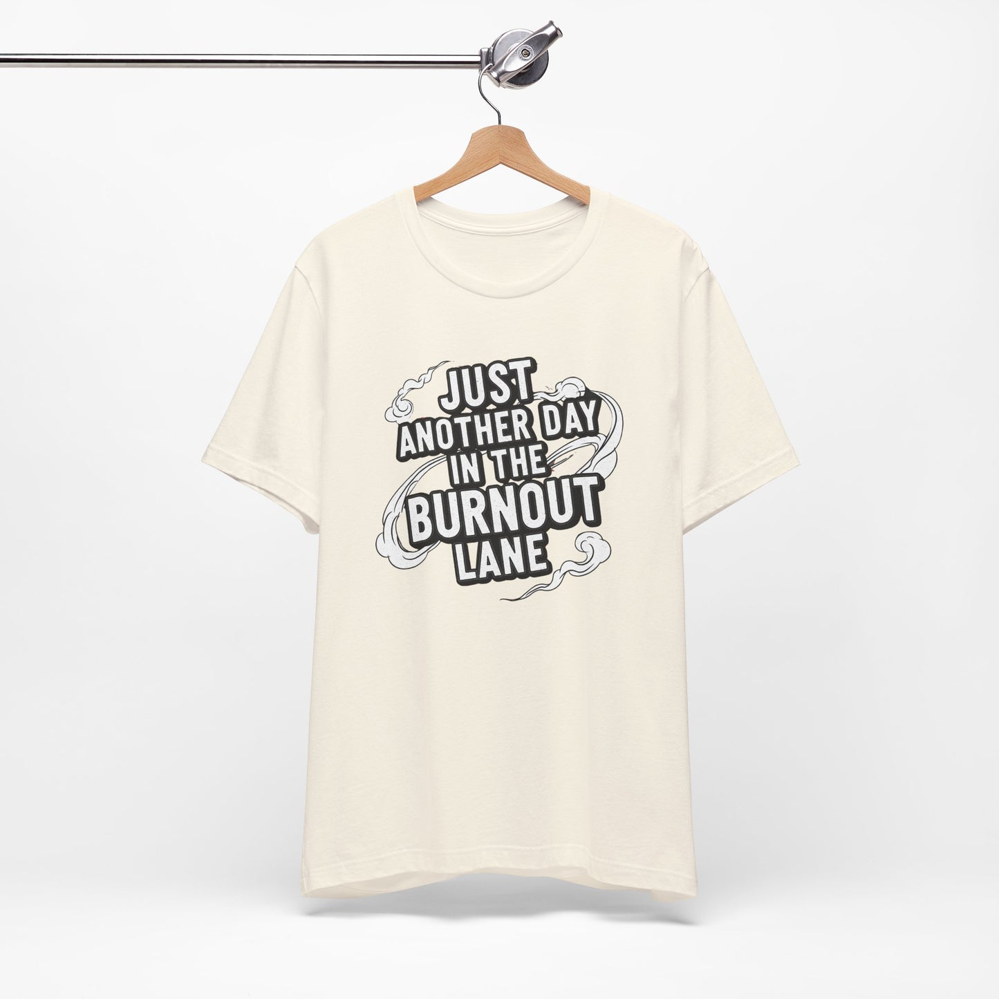 White t-shirt with black text on a hanger against a white background