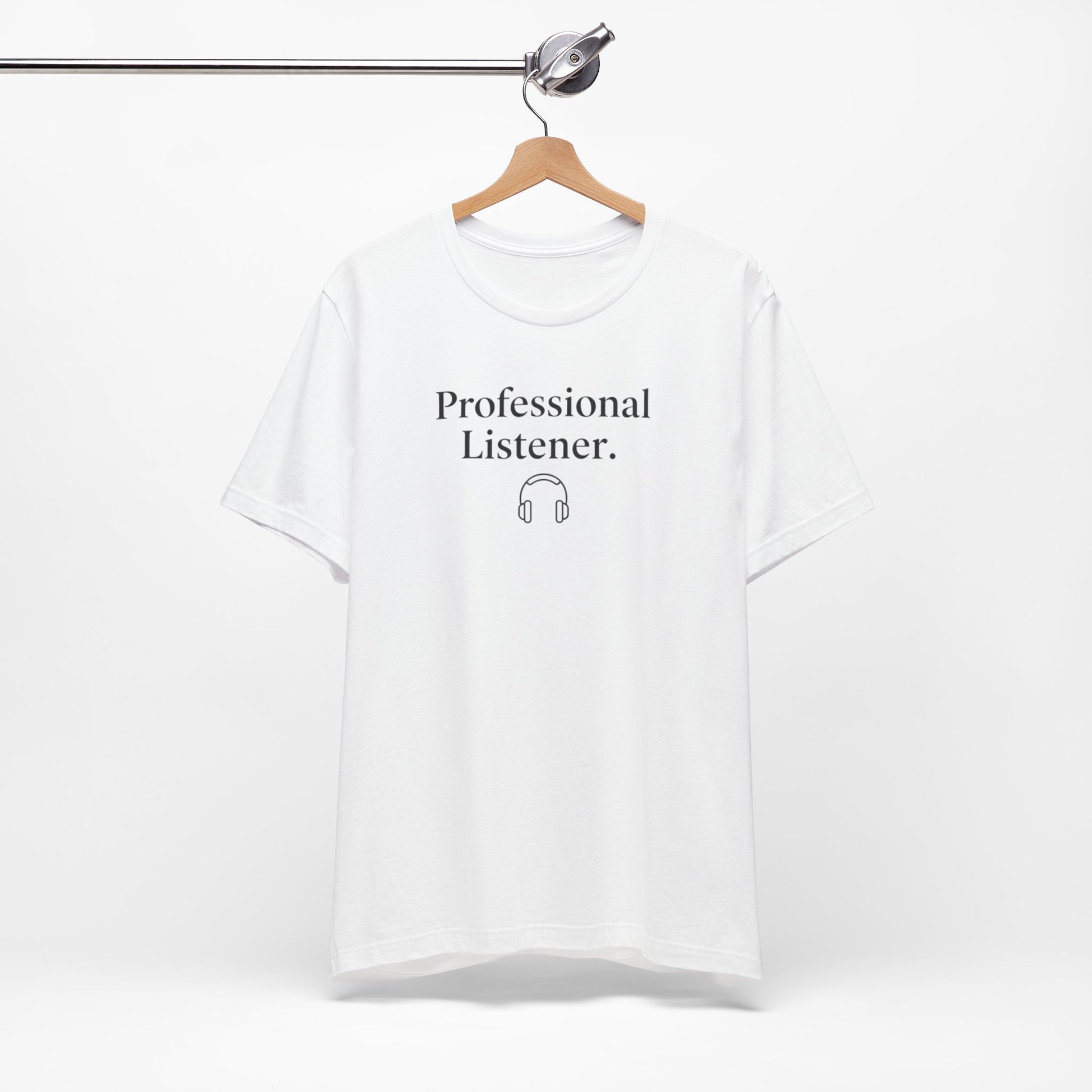 White t-shirt with 'Professional Listener' text on a hanger against a white background