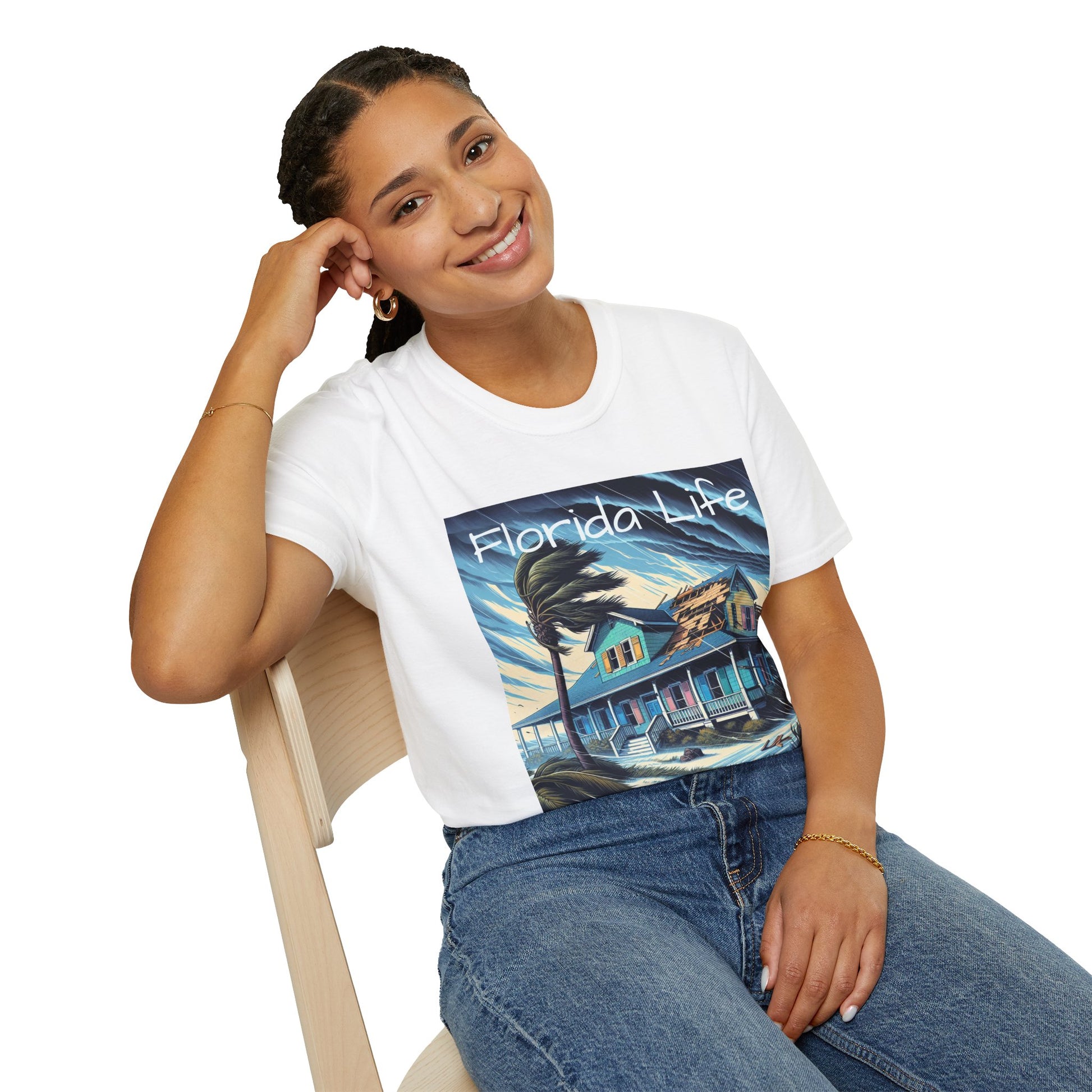 Person wearing a 'Florida Life' t-shirt with a beach house graphic.