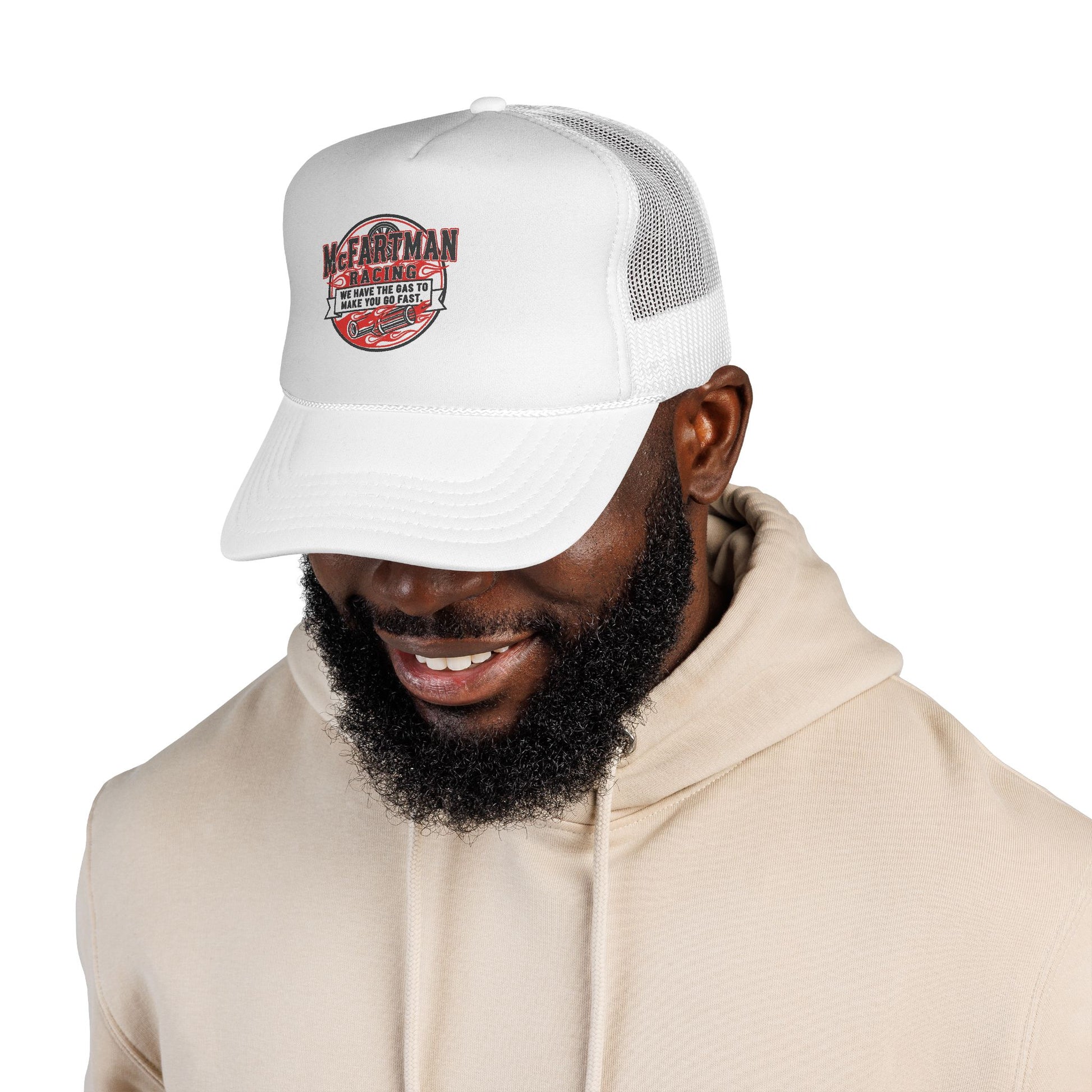 Man wearing a white cap with a logo McFARTMAN Racing We have the gas to make you go fast on a white background