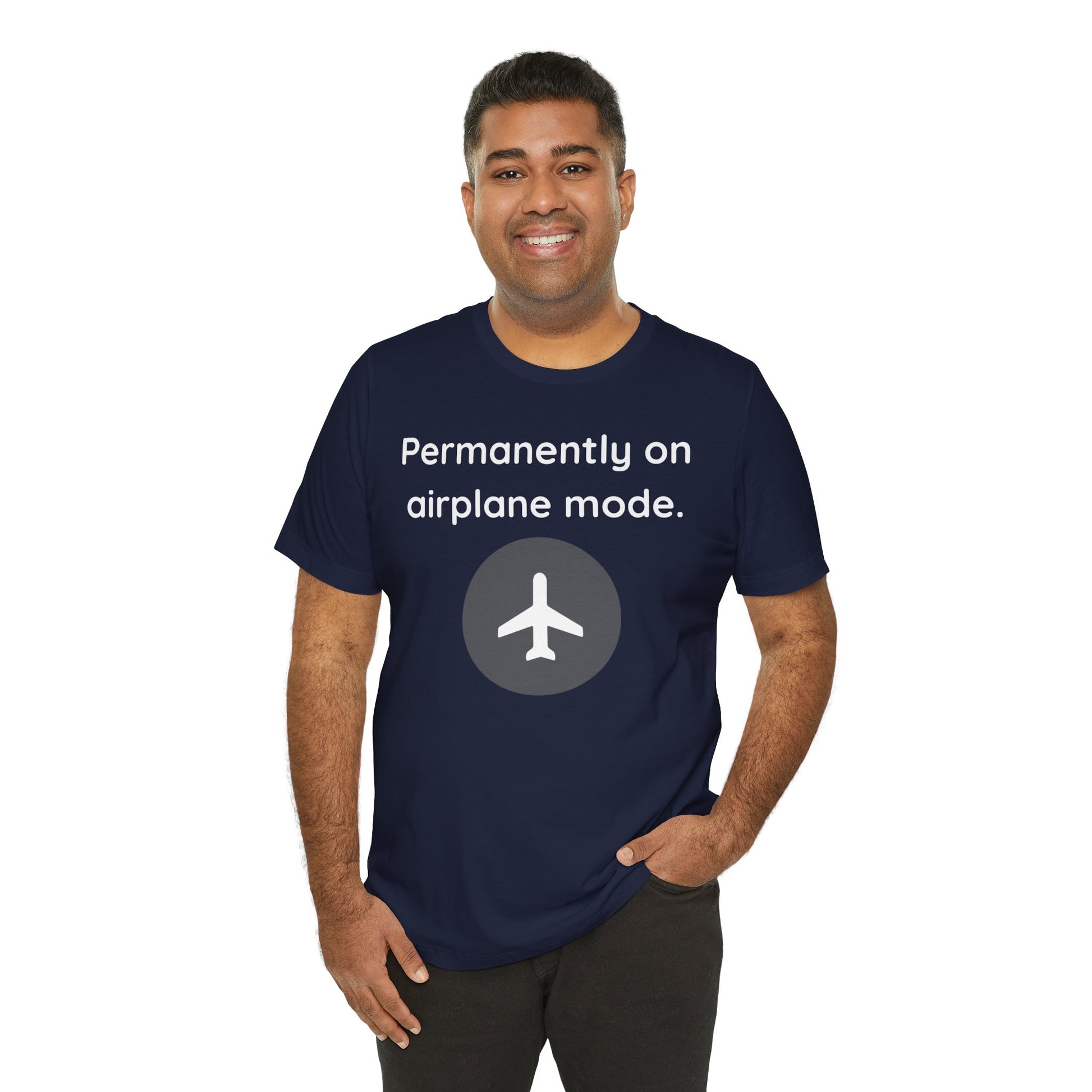 Man wearing a navy blue t-shirt with text 'Permanently on airplane mode' and airplane icon on a white background