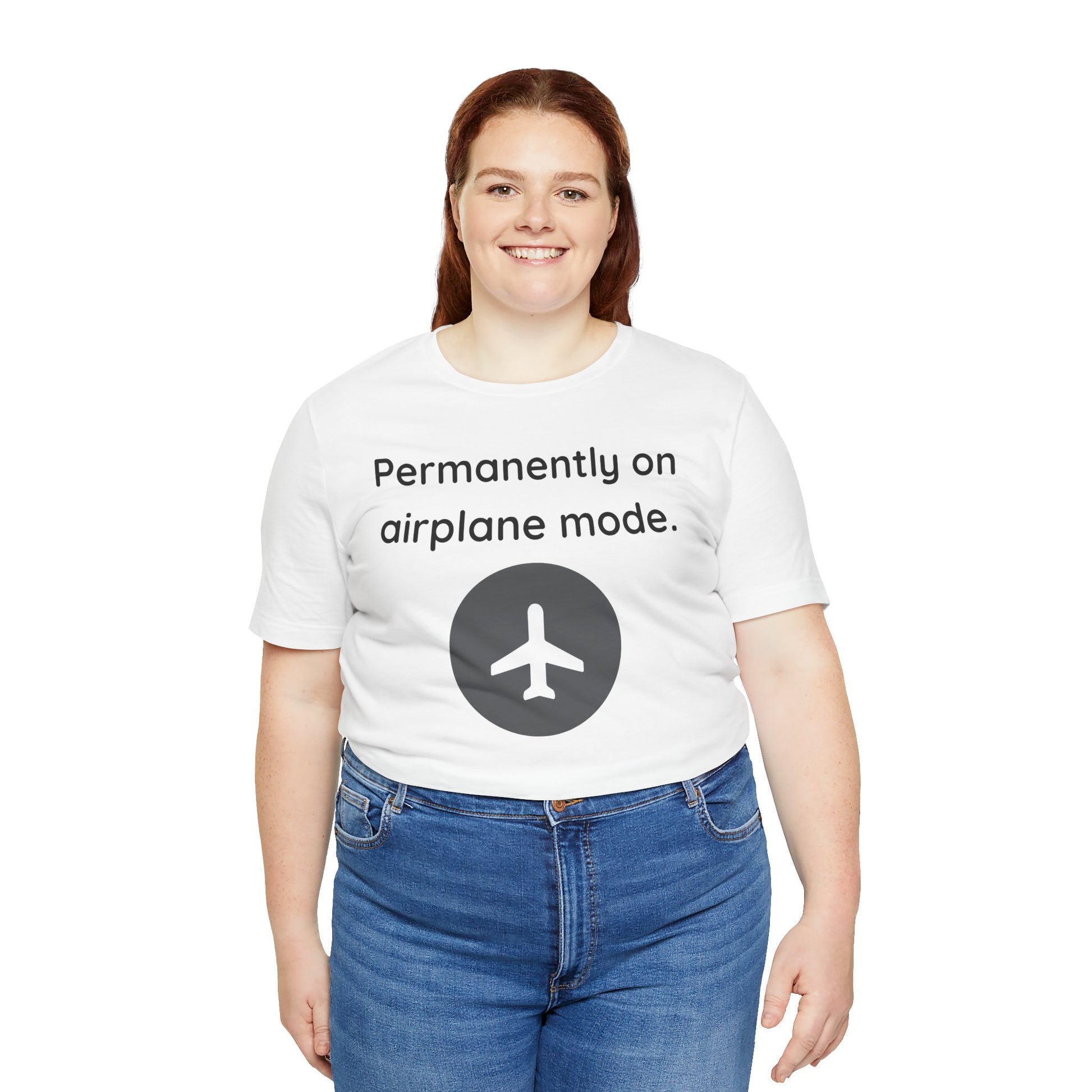Person wearing a white t-shirt with text 'Permanently on airplane mode' and an airplane icon on a white background
