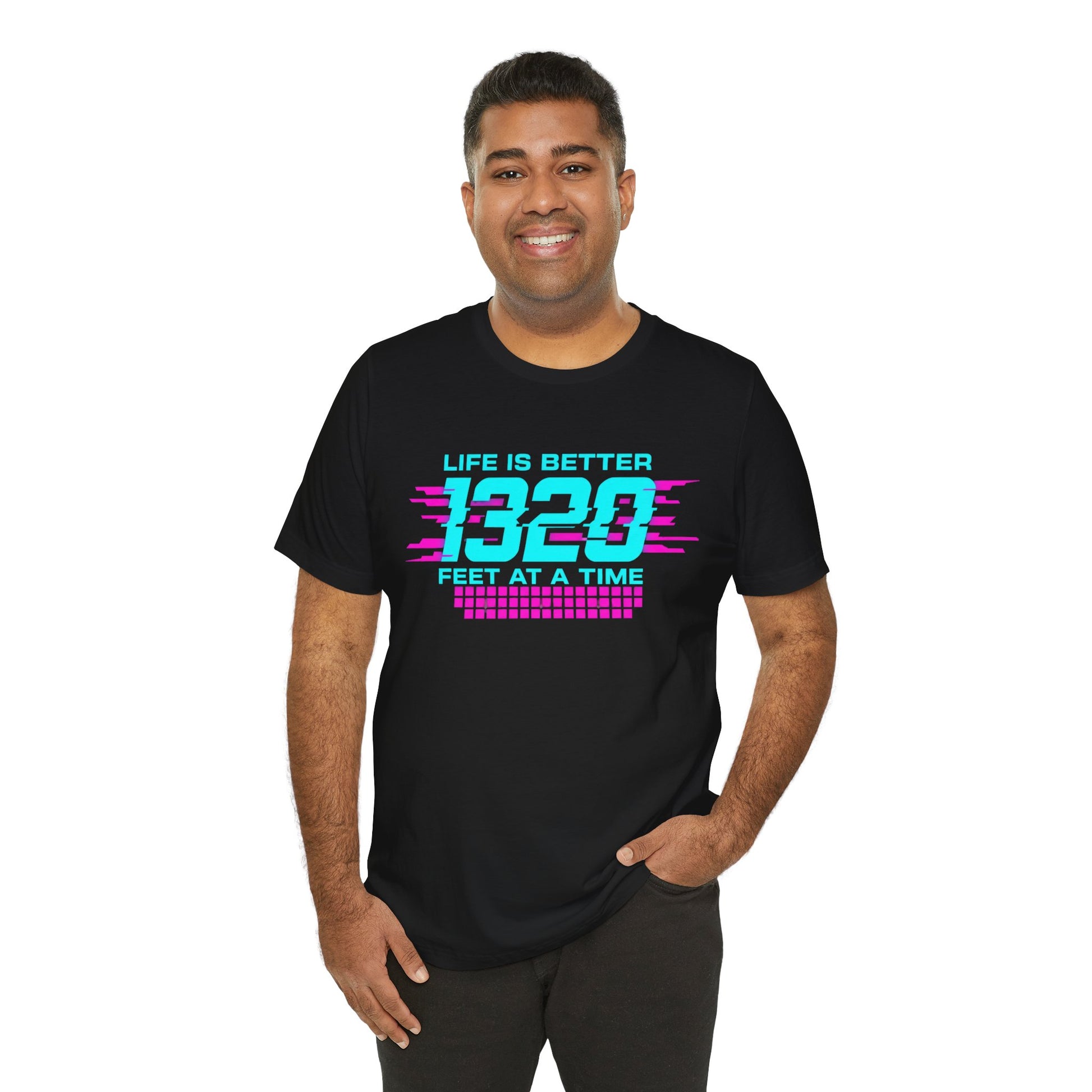 Man wearing a black t-shirt with colorful text 'Life is better 1320 feet at a time' design on a white background
