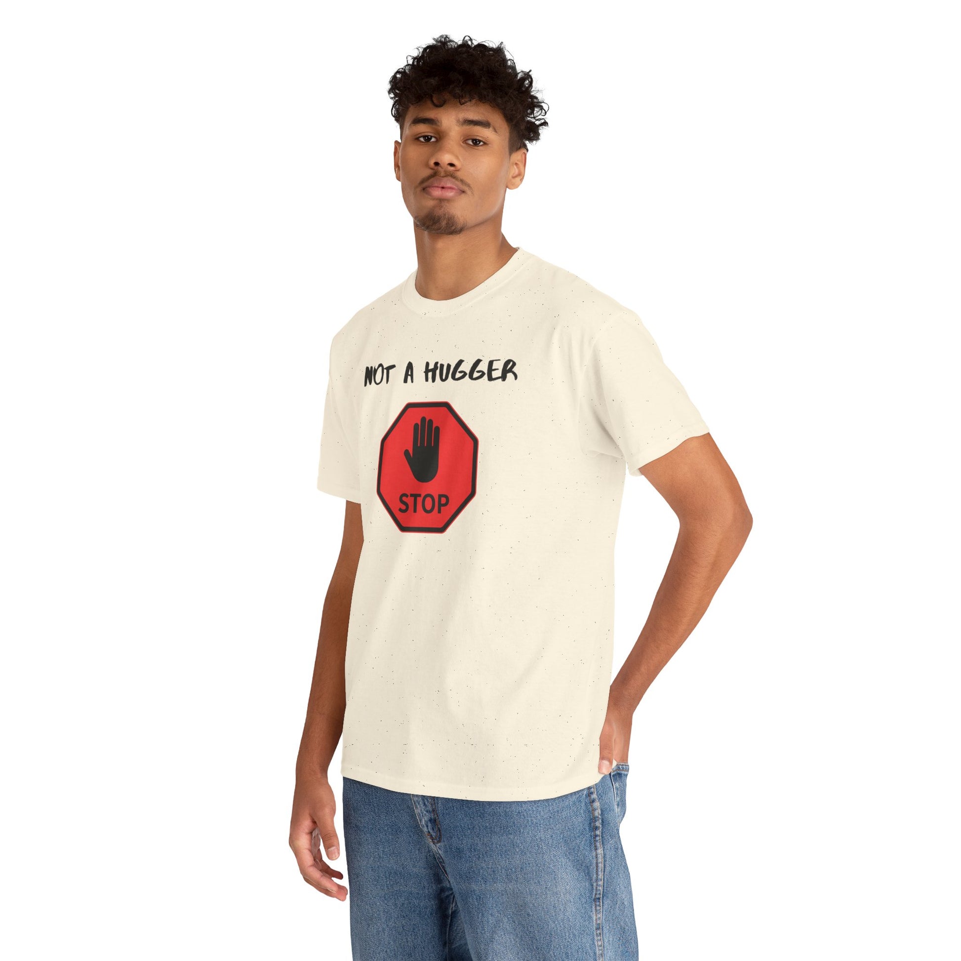 Person wearing a cream t-shirt with a graphic and text 'NOT A HUGGER' on a white background
