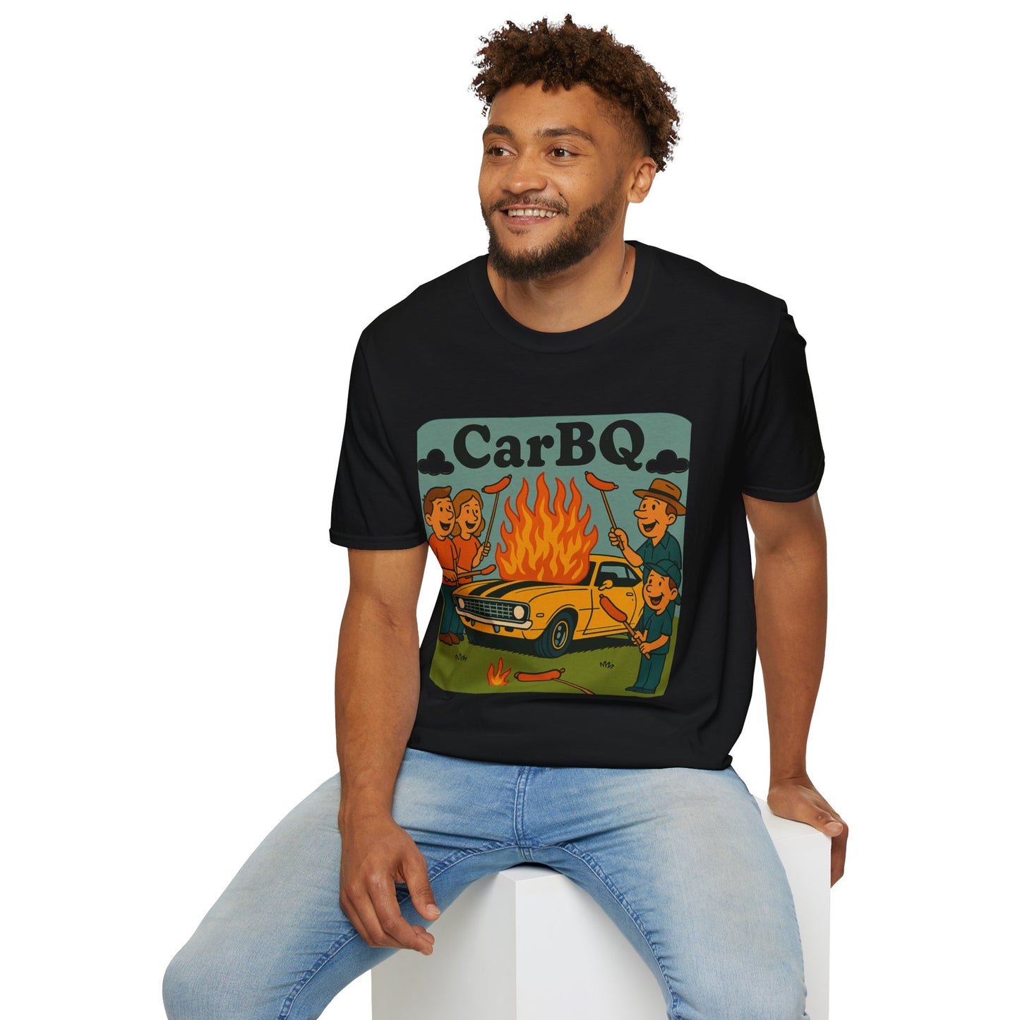 Man wearing a black t-shirt with a graphic design and text 'CarBQ' sitting on a white stool.