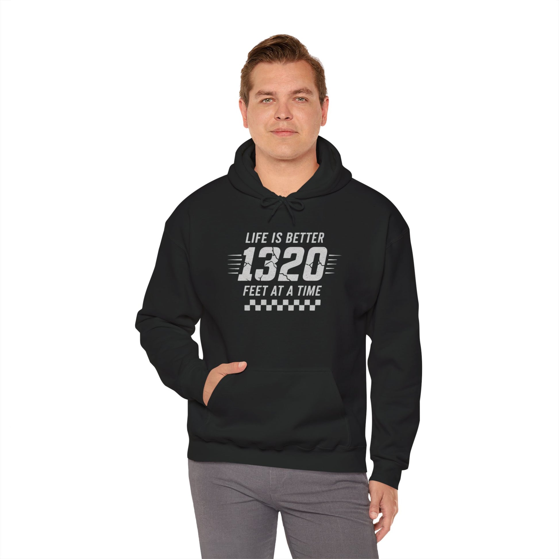 Person wearing a black hoodie with text 'Life is better 1320 feet at a time' on a white background