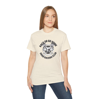 Woman wearing a beige t-shirt with a graphic design and text 'RACE OR GO HOME DRAG RACERS CLUB' on a white background