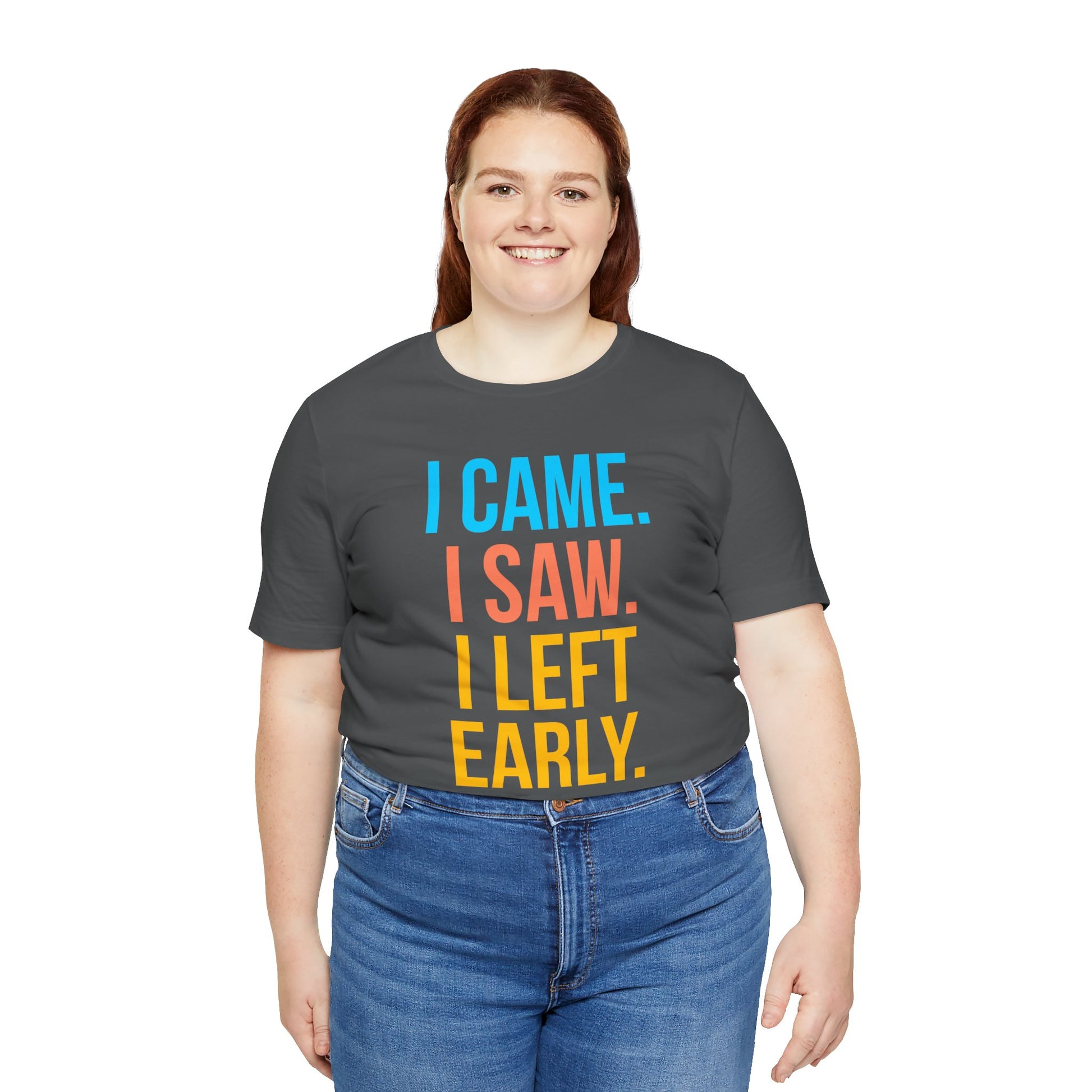 Person wearing a dark gray t-shirt with colorful text 'I CAME. I SAW. I LEFT EARLY.' on a white background