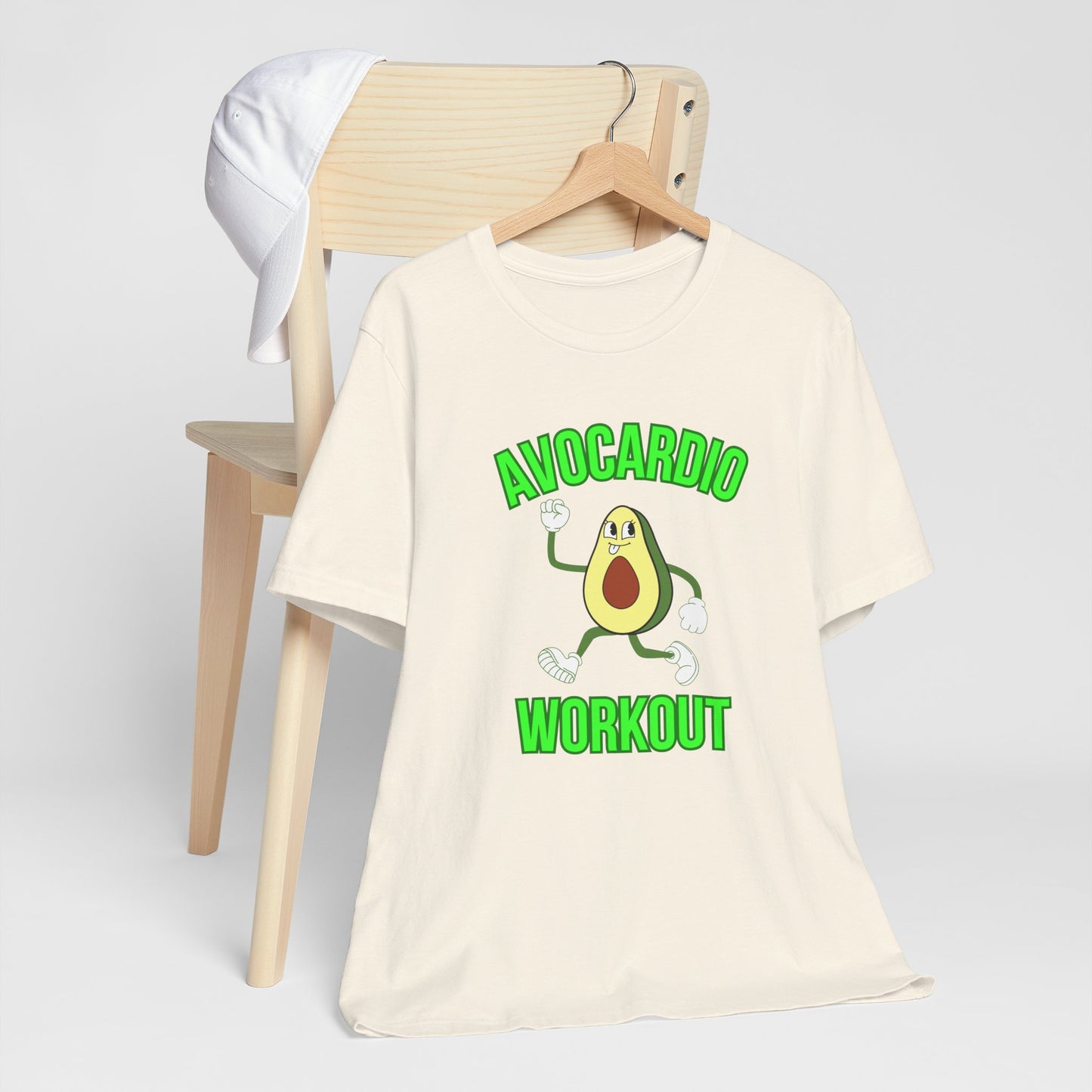 Beige t-shirt with avocado graphic and text 'Avocardio workout' on a white background