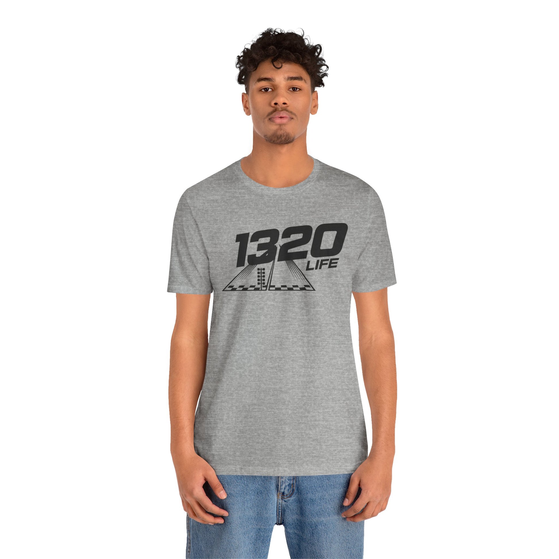 Person wearing a gray t-shirt with '1320 LIFE' design on a white background