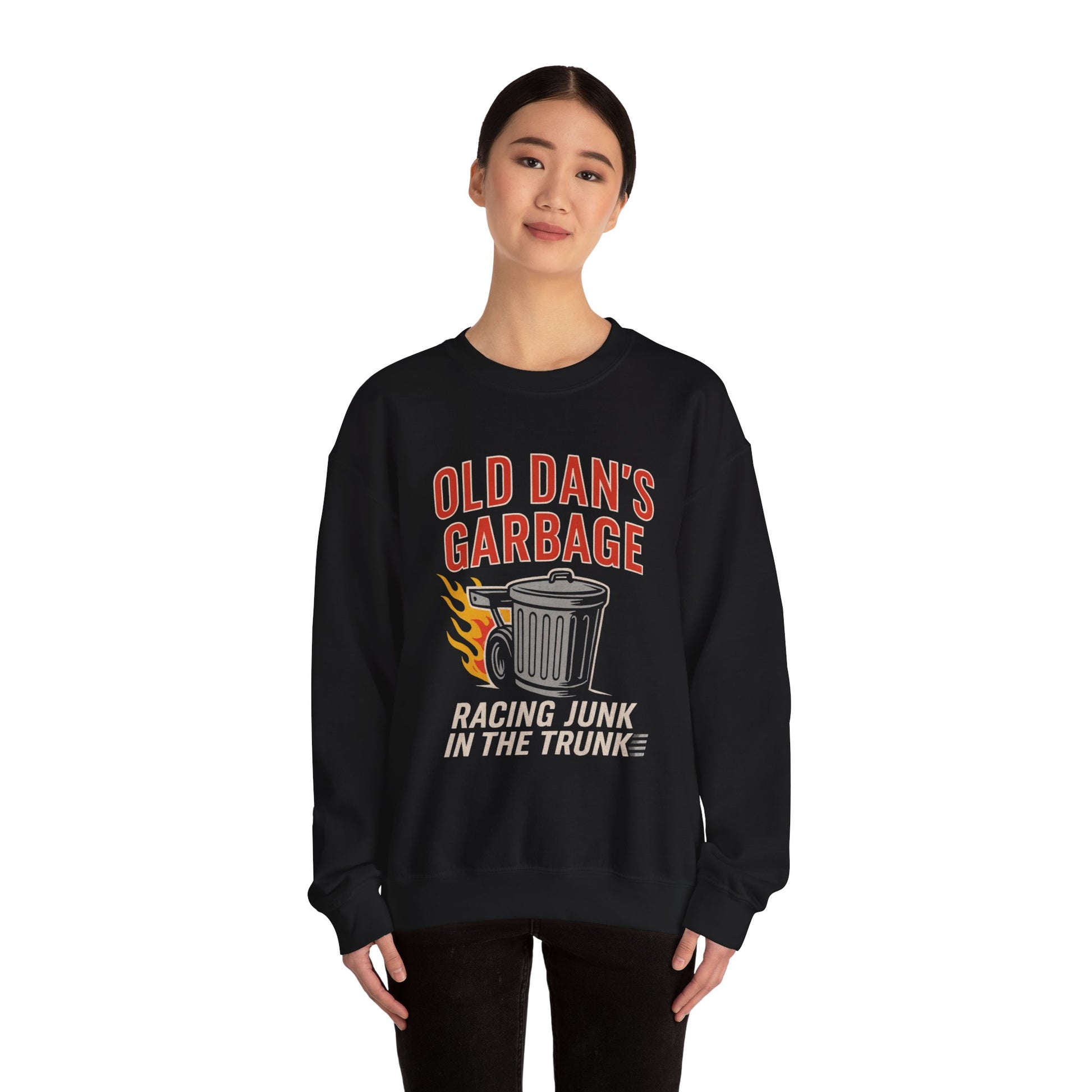 Young woman wearing a black Gildan 18000 sweatshirt with Old Dan's Garbage Racing Junk in the Trunk graphic.