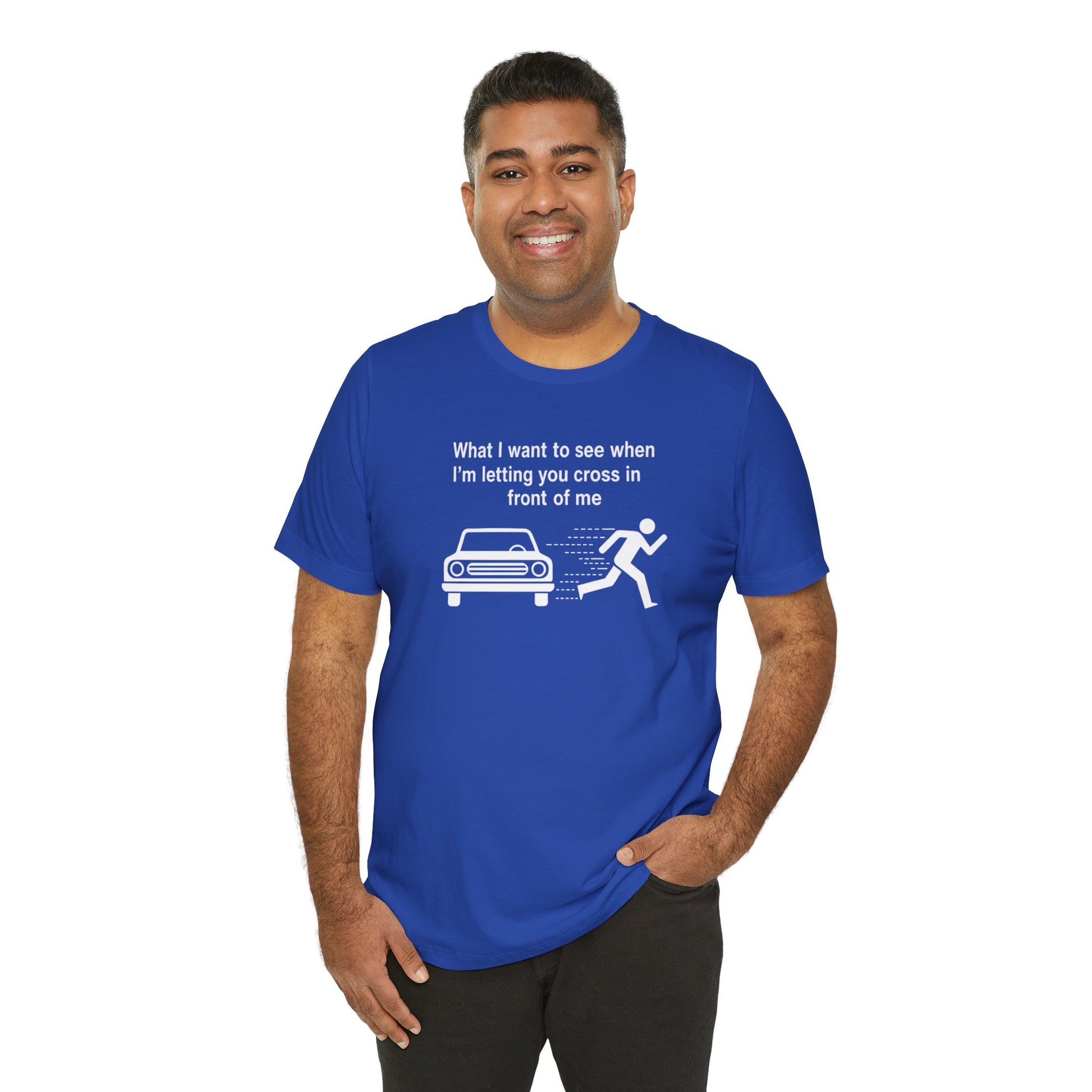 Man wearing a blue t-shirt with a graphic and text 'What I want to see when I'm letting you cross in front of me' on a white background