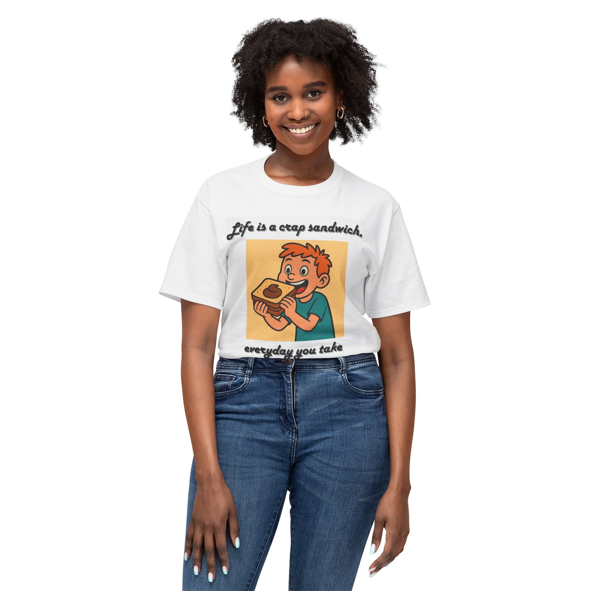 Person wearing a white t-shirt with a graphic of a boy eating a sandwich and text 'Life is a crap sandwich, everyday you take another bite!' on a white background