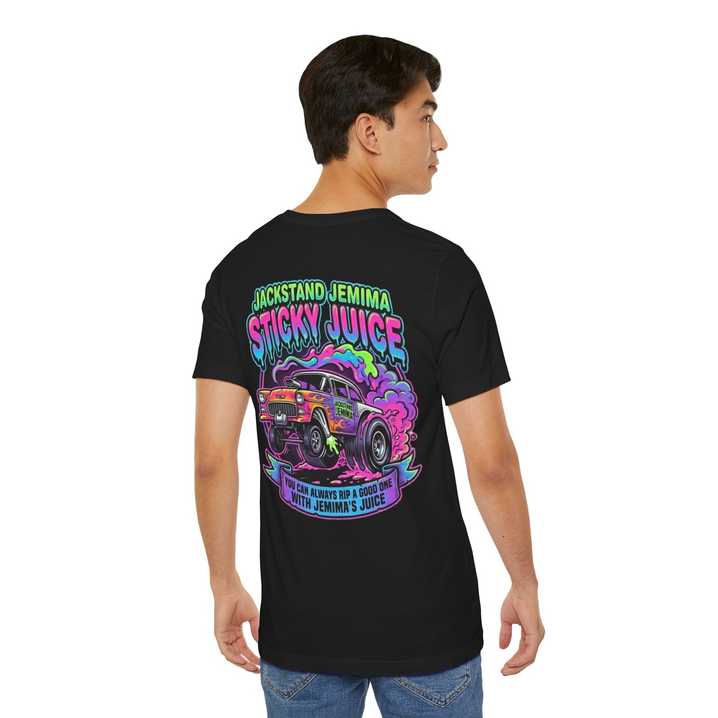 Person wearing a black t-shirt with colorful graphic design and text  'Jackedstand Jemima Sticky Juice You Can Always Rip A Good One With Jemima's Juice' on the back