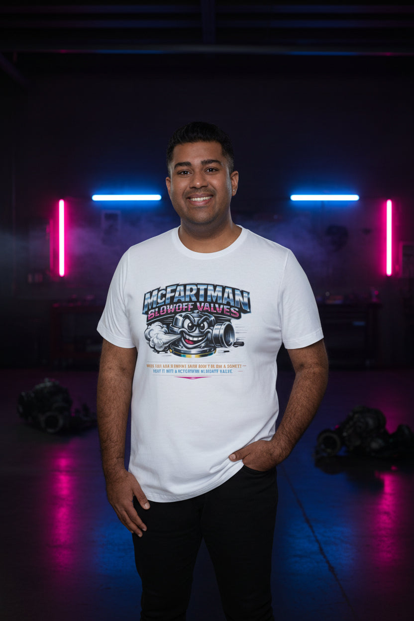 Man wearing a white t-shirt with a graphic design and 'McFartman Blowoff Valves When You Are Running Hard Don't Blow A Gasket Vent It With A McFartman Blowout Valve' text on a white background