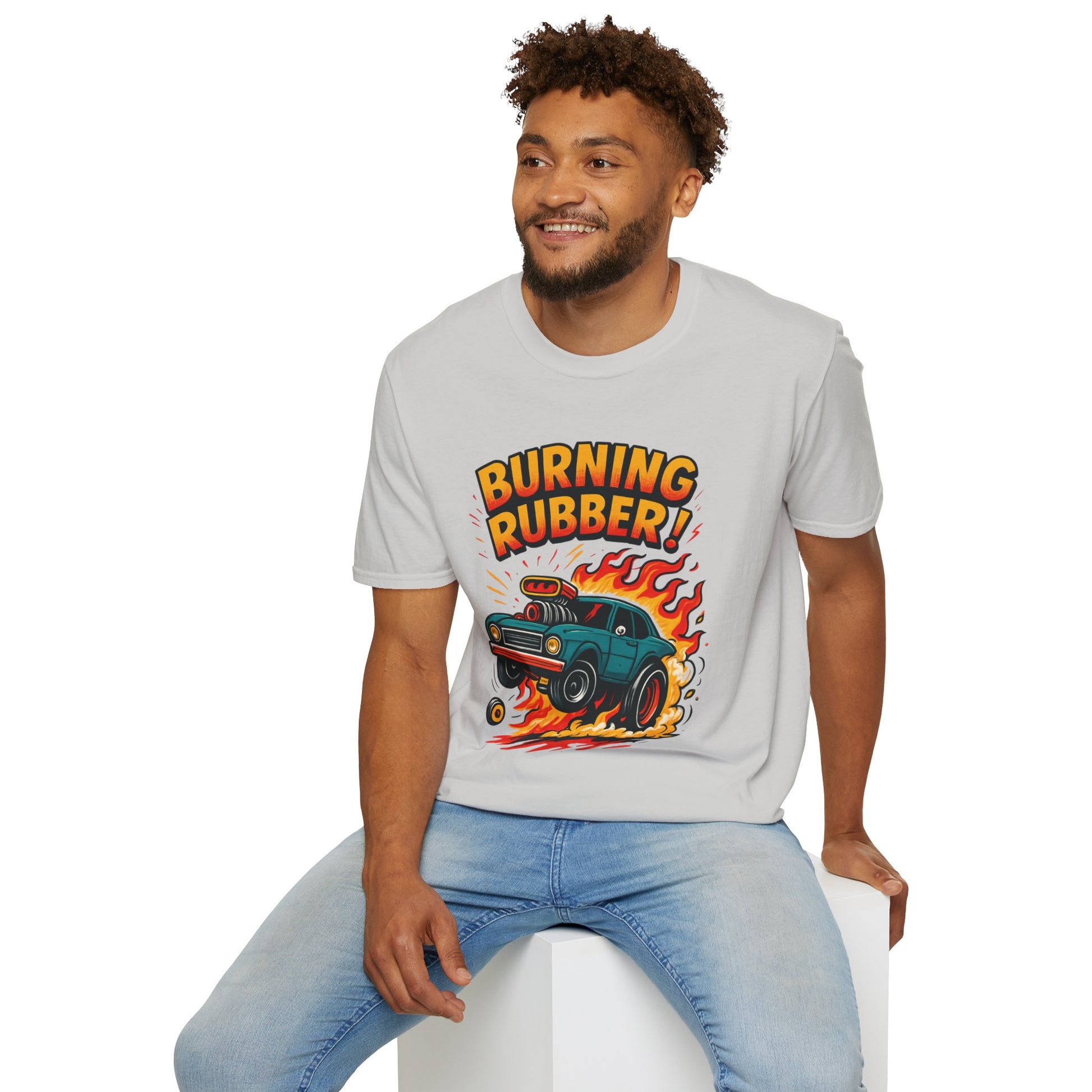 Man wearing a gray t-shirt with 'Burning Rubber!' graphic design on a white background