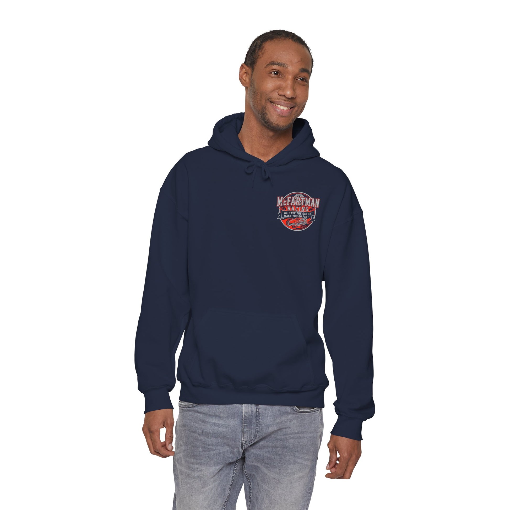 Man wearing a navy hoodie with a logo McFartman Racing We have the gas to make you go fast on a white background
