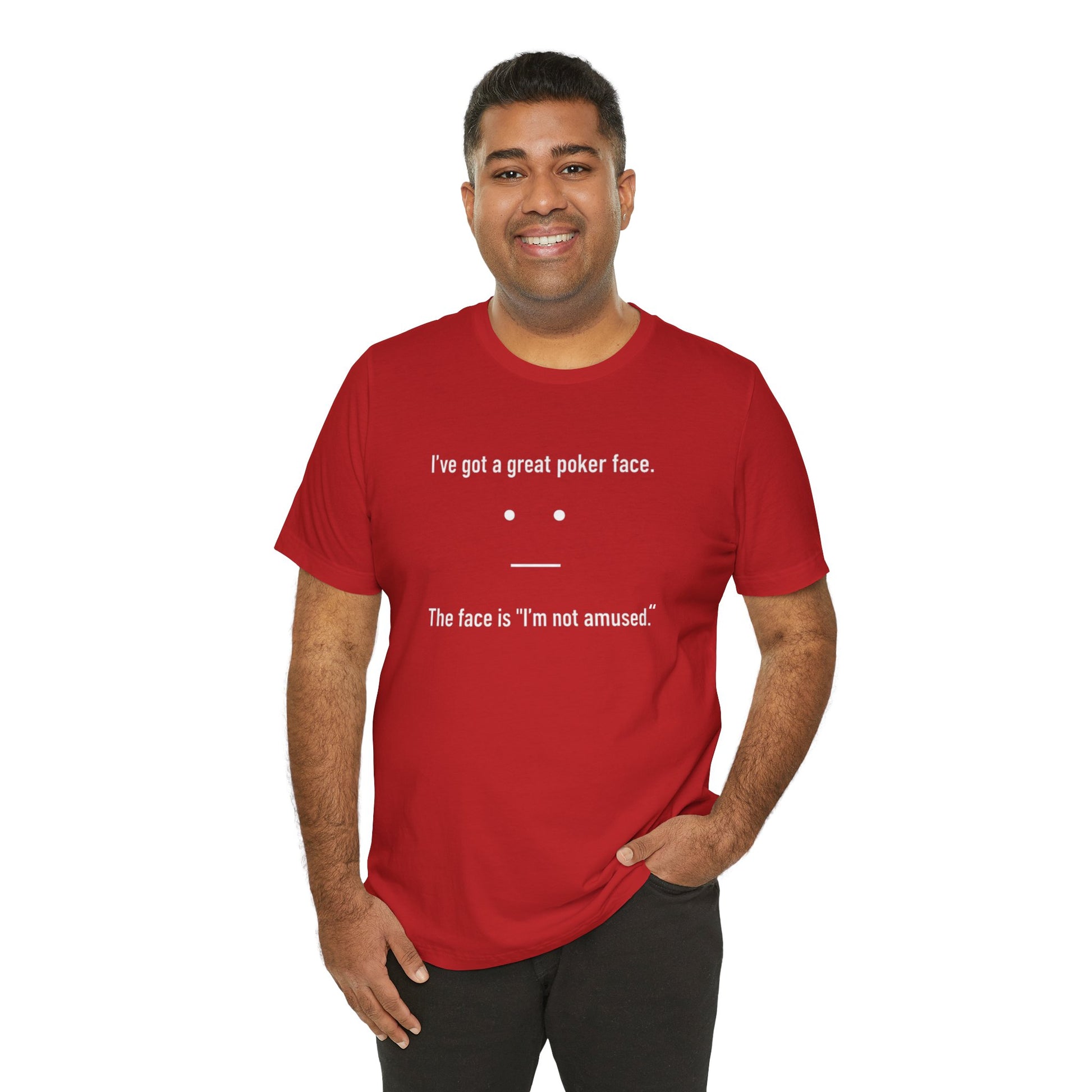 Man wearing a red t-shirt with text 'I've got a great poker face. The face is I'm not amused.' and a face graphic on a white background