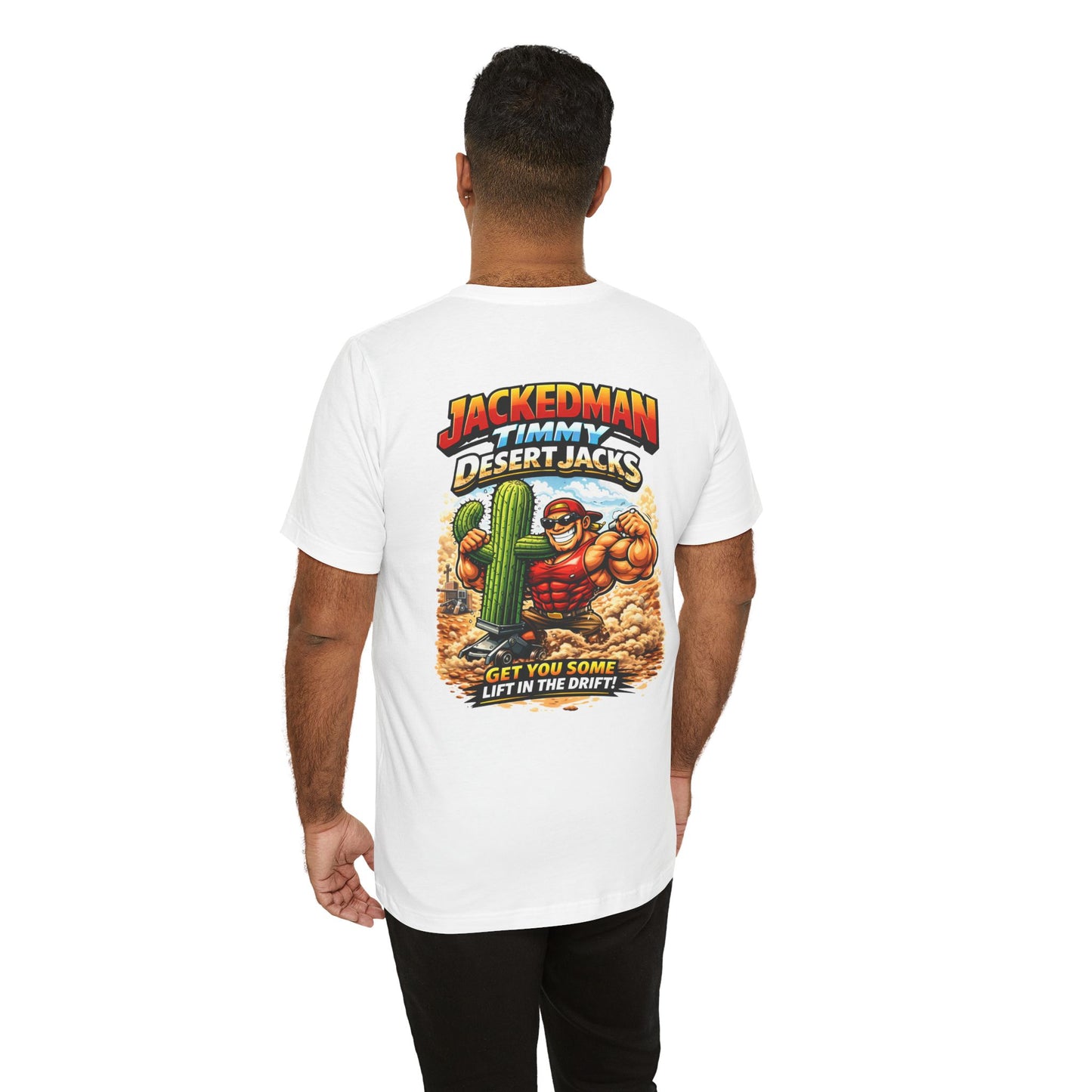 Person wearing a white t-shirt with a graphic design on the back, featuring 'Jackedman Timmy Desert Jacks Get You Some Lift In The Drift' text and a character.